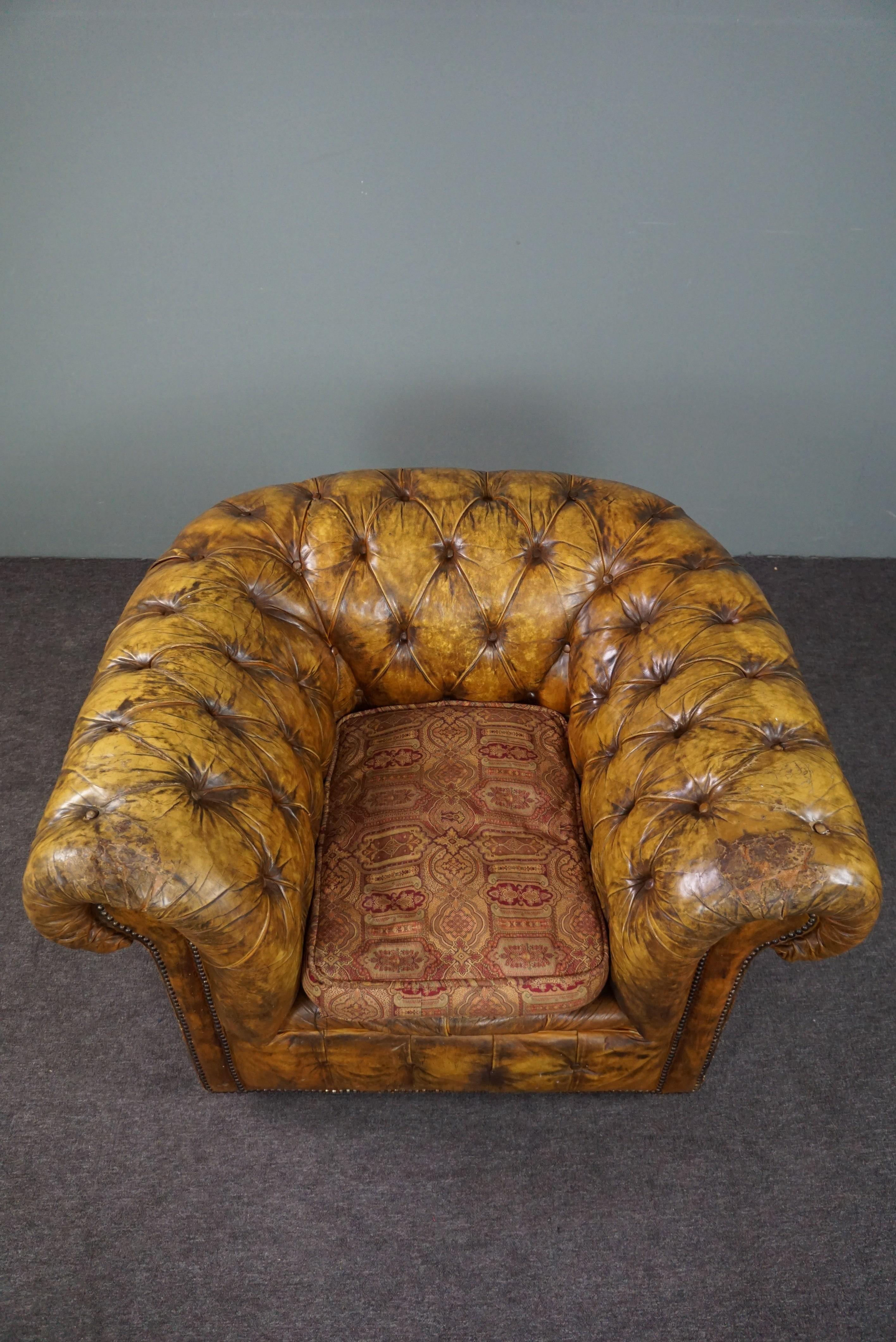 Very beautiful old Chesterfield armchair full of patina In Fair Condition For Sale In Harderwijk, NL