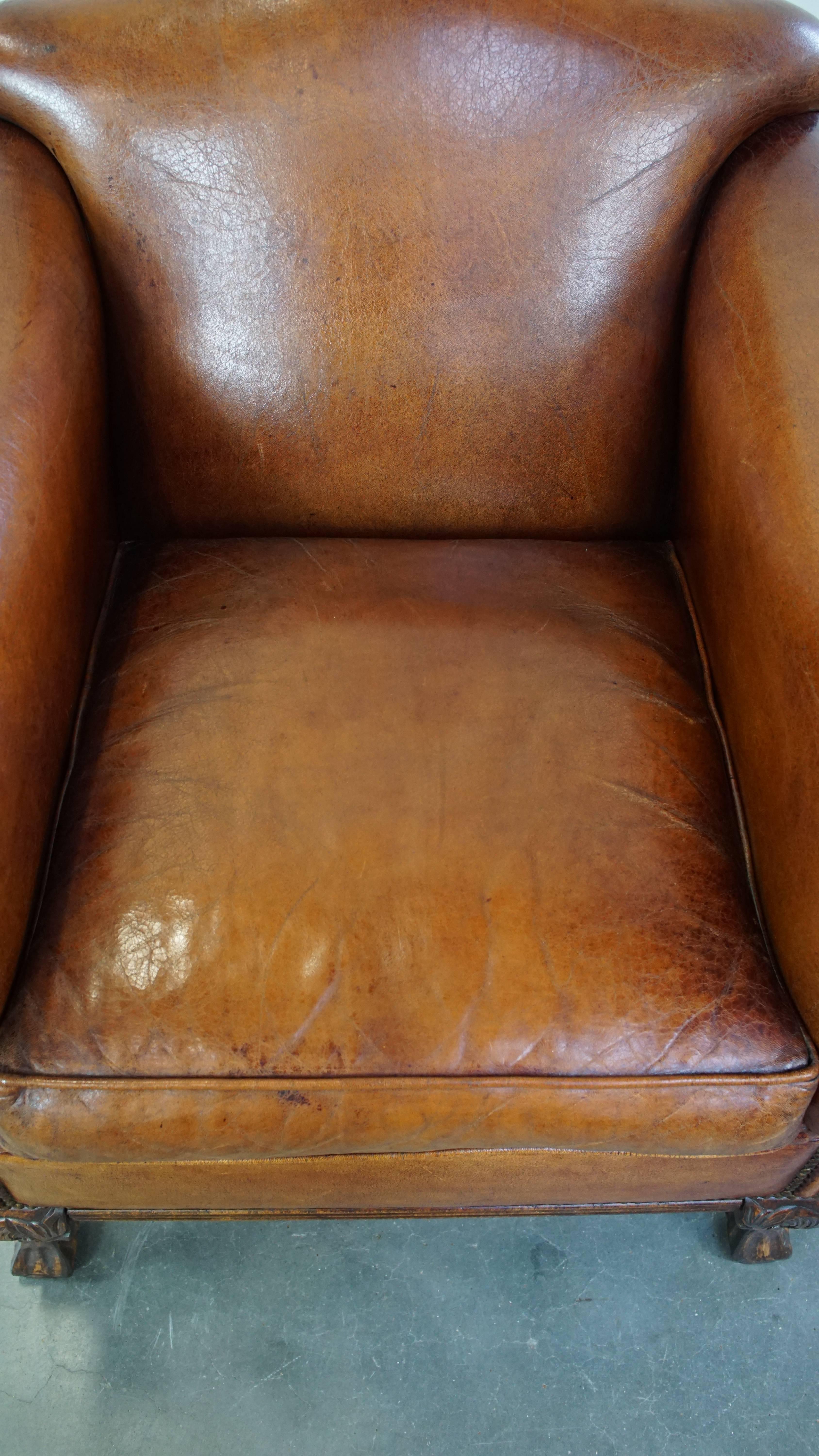 Sheepskin Very beautiful sheepskin armchair with an elegant design and wood-carved legs For Sale