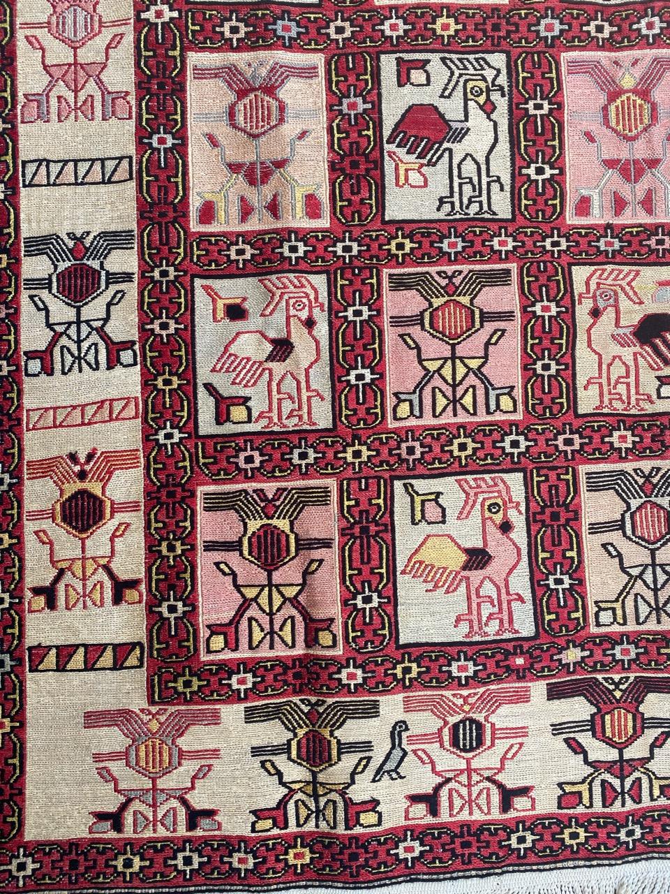 Pretty verneh silk Kilim with a geometrical stylized design and beautiful colors with red, pink and beige, entirely hand embroidered with soumak method with silk on cotton foundation.

✨✨✨
