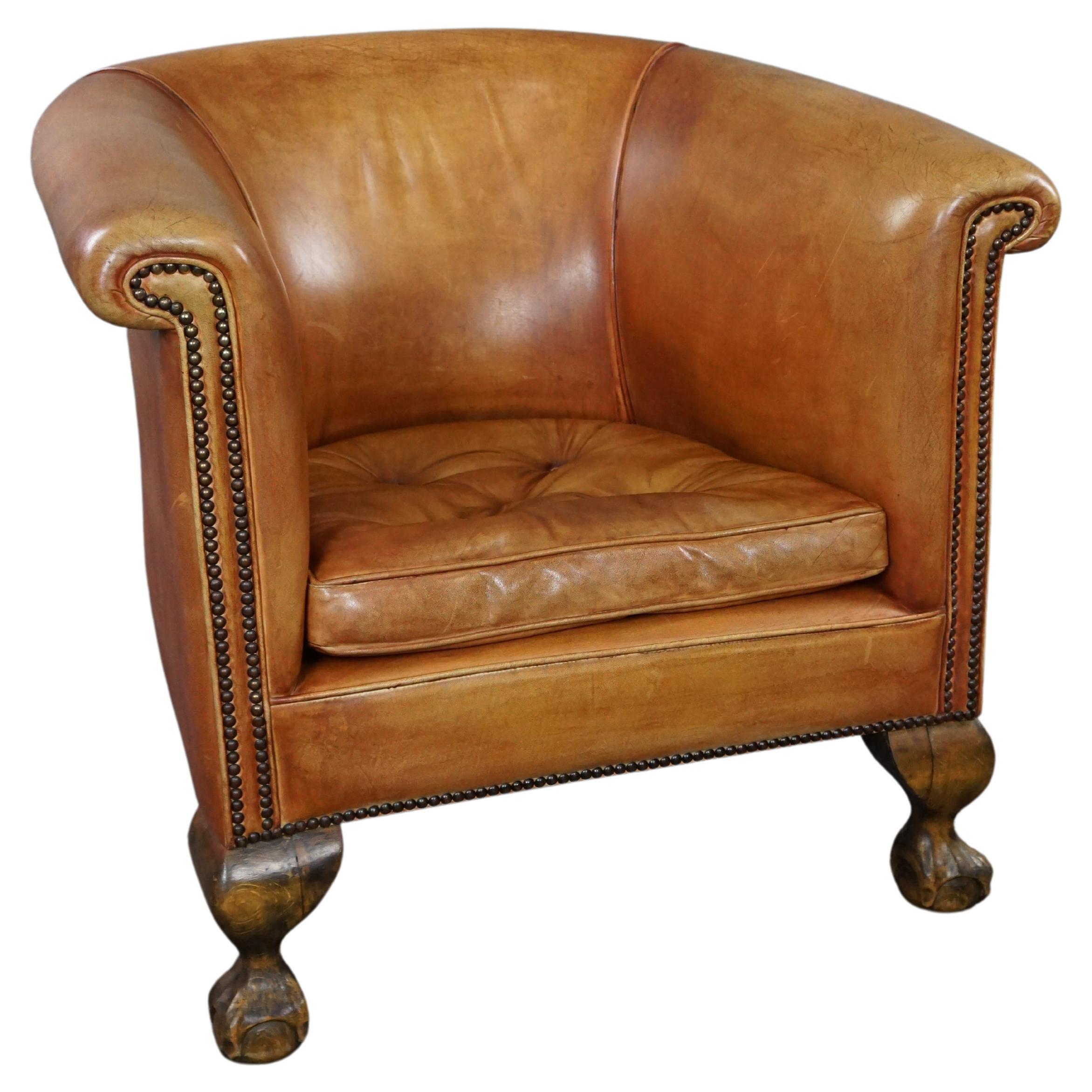 Very beautiful, uncommon cowhide club chair For Sale