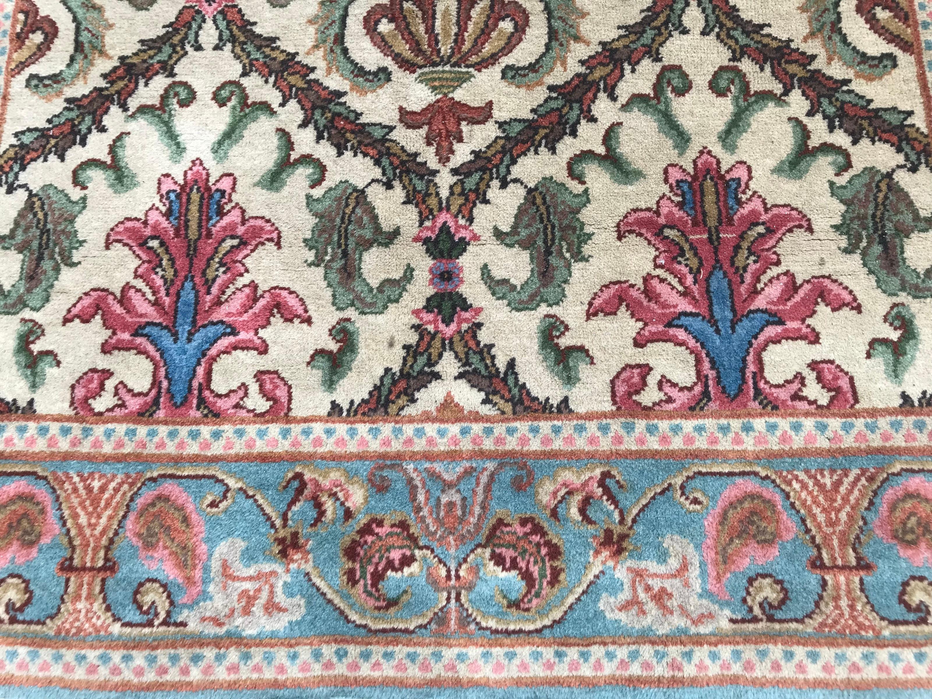 Wonderful mid-20th century Transylvanian rug with beautiful 17th century European Victorian design and nice colors with green, blue and pink, entirely hand knotted with wool velvet on cotton foundation.