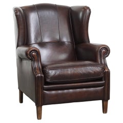 Sehr schöner Ohrensessel aus Rindsleder im englischen Stil