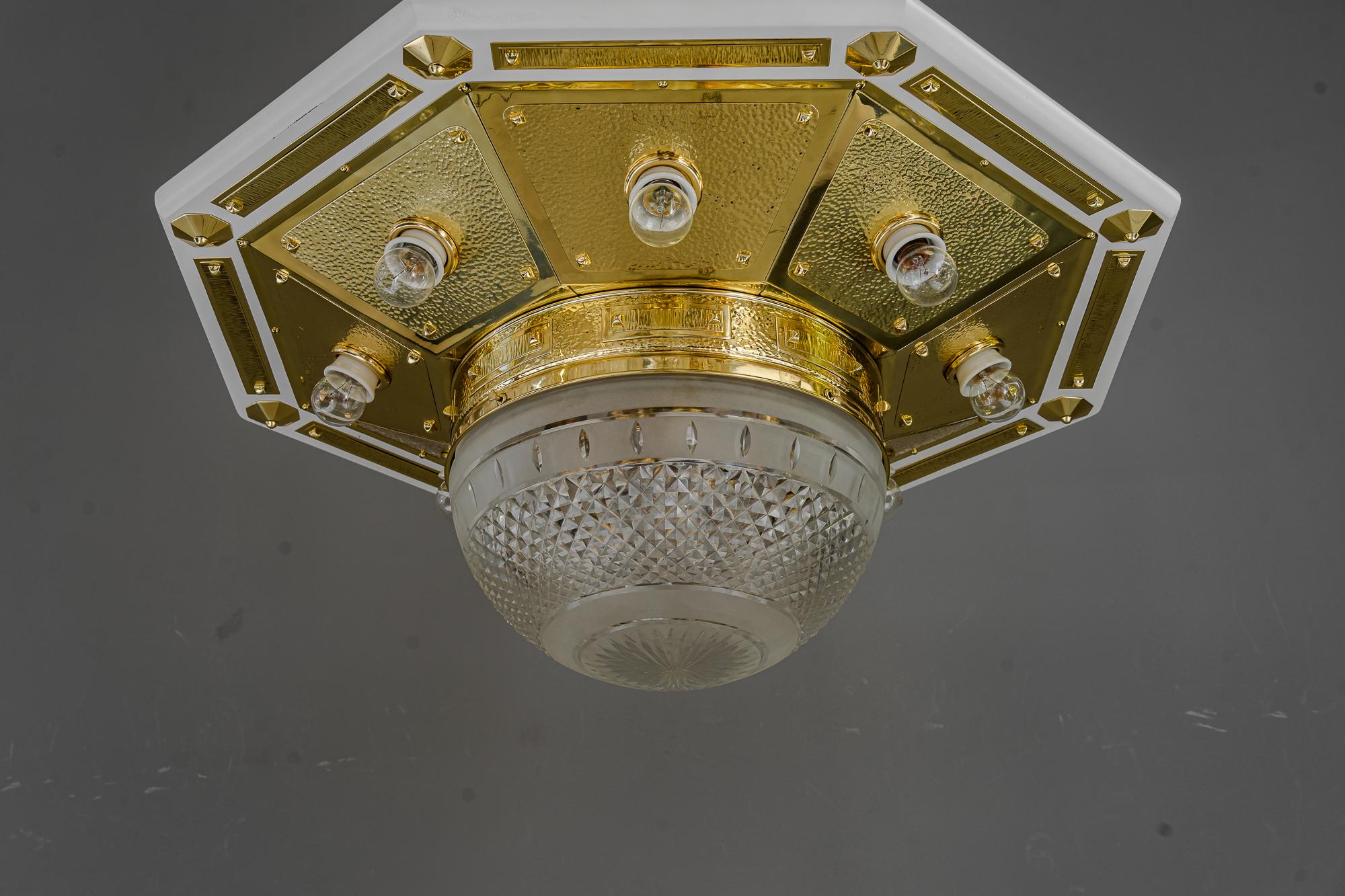 Very big octagon art deco ceiling lamp vienna around 1920s
Brass polished and stove enameled.