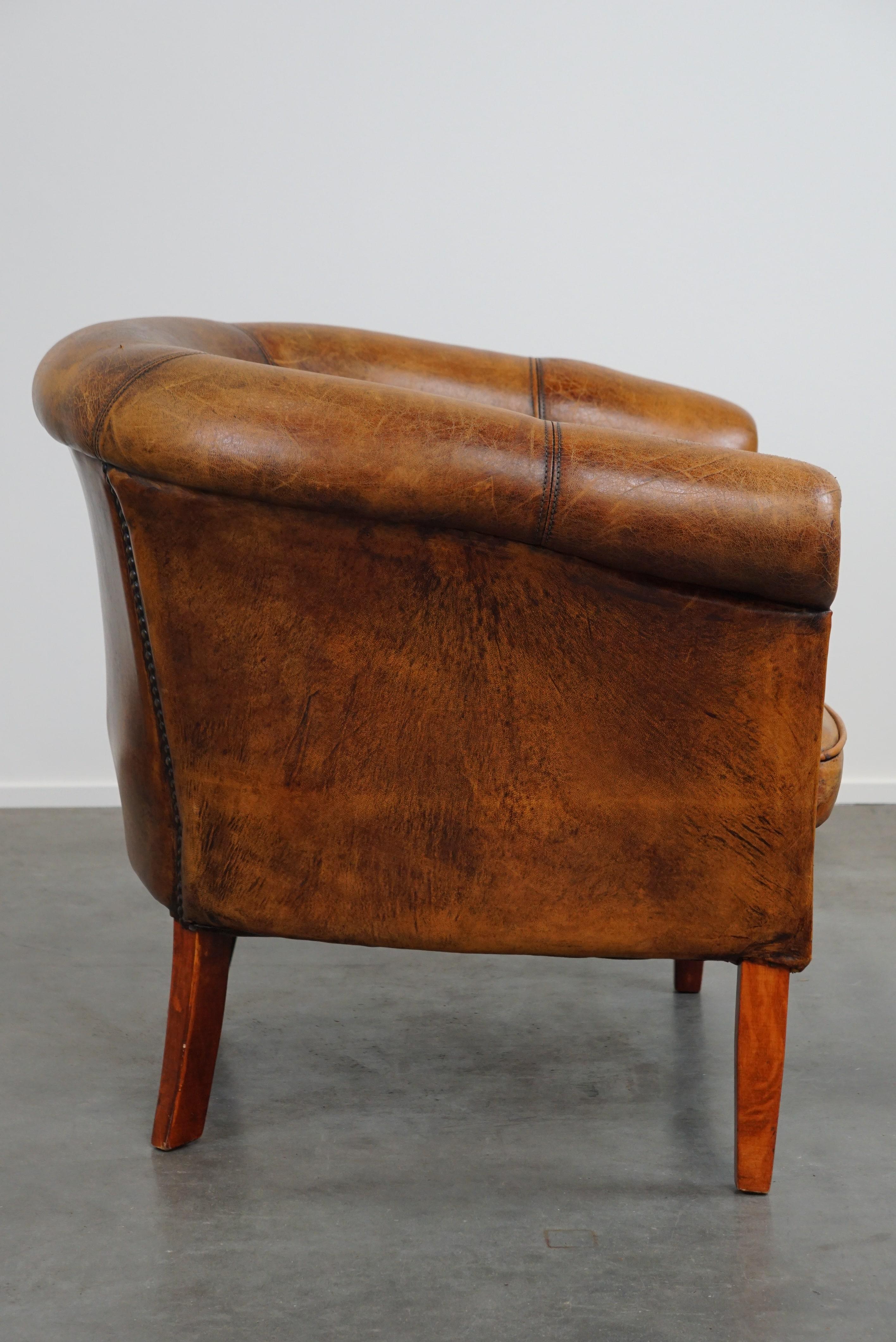 Dutch Very charming subtle sheep leather club armchair with beautiful colors and decor For Sale