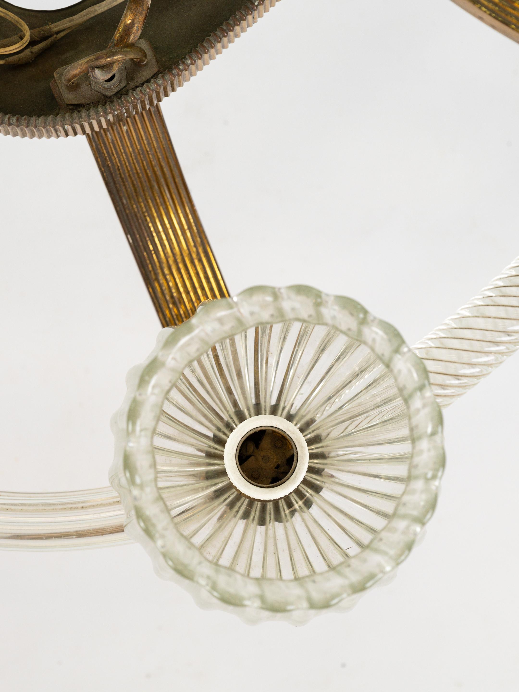 Impressive pendant light in brass and murano glass. 

6 bulb holders. 

Good condition. 

Italian work from the fifties. 

More information upon request. 
