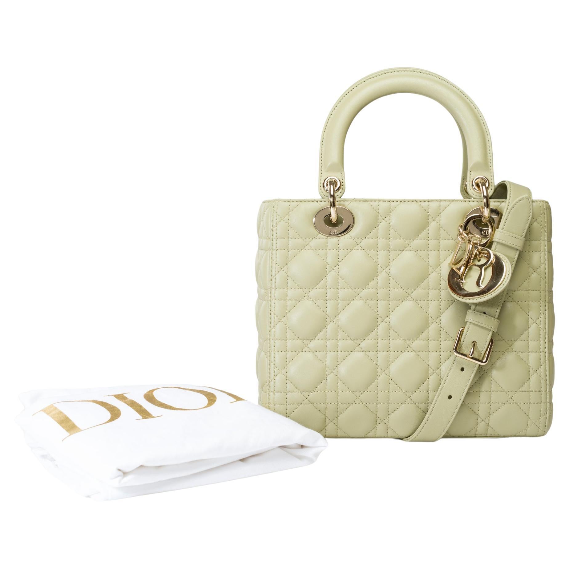 Very​ ​chic​ ​Dior​ ​Lady​ ​Dior​ ​Medium​ ​(MM)​ ​shoulder​ ​bag​ ​in​ ​green​ ​cannage​ ​leather,​ ​with​ ​gold-tone​ ​metal​ ​hardware,​ ​double​ ​handles​ ​in​ ​green​ ​leather,​ ​and​ ​a​ ​removable​ ​green​ ​leather​ ​shoulder​ ​strap​ ​for​