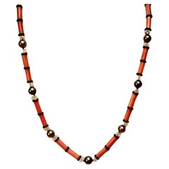 Très chic corail naturel rouge orangé, perle de Tahiti, cristal et onyx noir