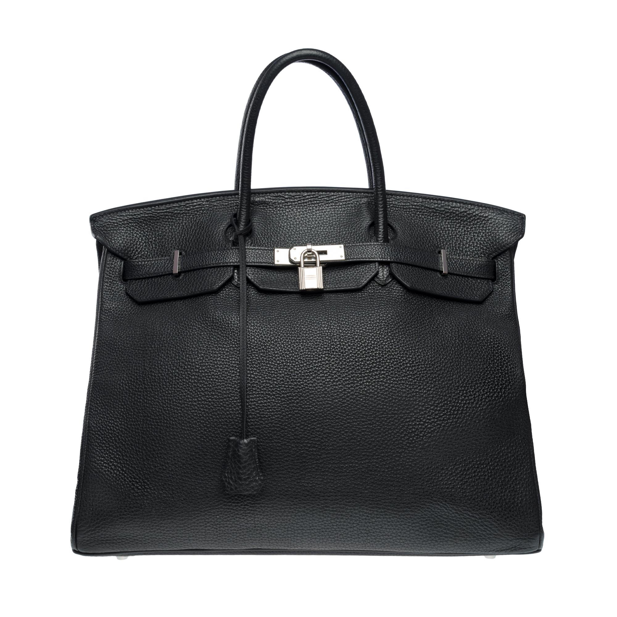 Beautiful​ ​Hermes​ ​Birkin​ ​40​ ​cm​ ​handbag​ ​in​ ​black​ ​Togo​ ​leather,​ ​palladium​ ​silver​ ​metal​ ​trim,​ ​double​ ​handle​ ​in​ ​black​ ​leather​ ​allowing​ ​a​ ​hand​ ​carry

Flap​ ​closure
Black​ ​leather​ ​inner​ ​lining,​ ​one​