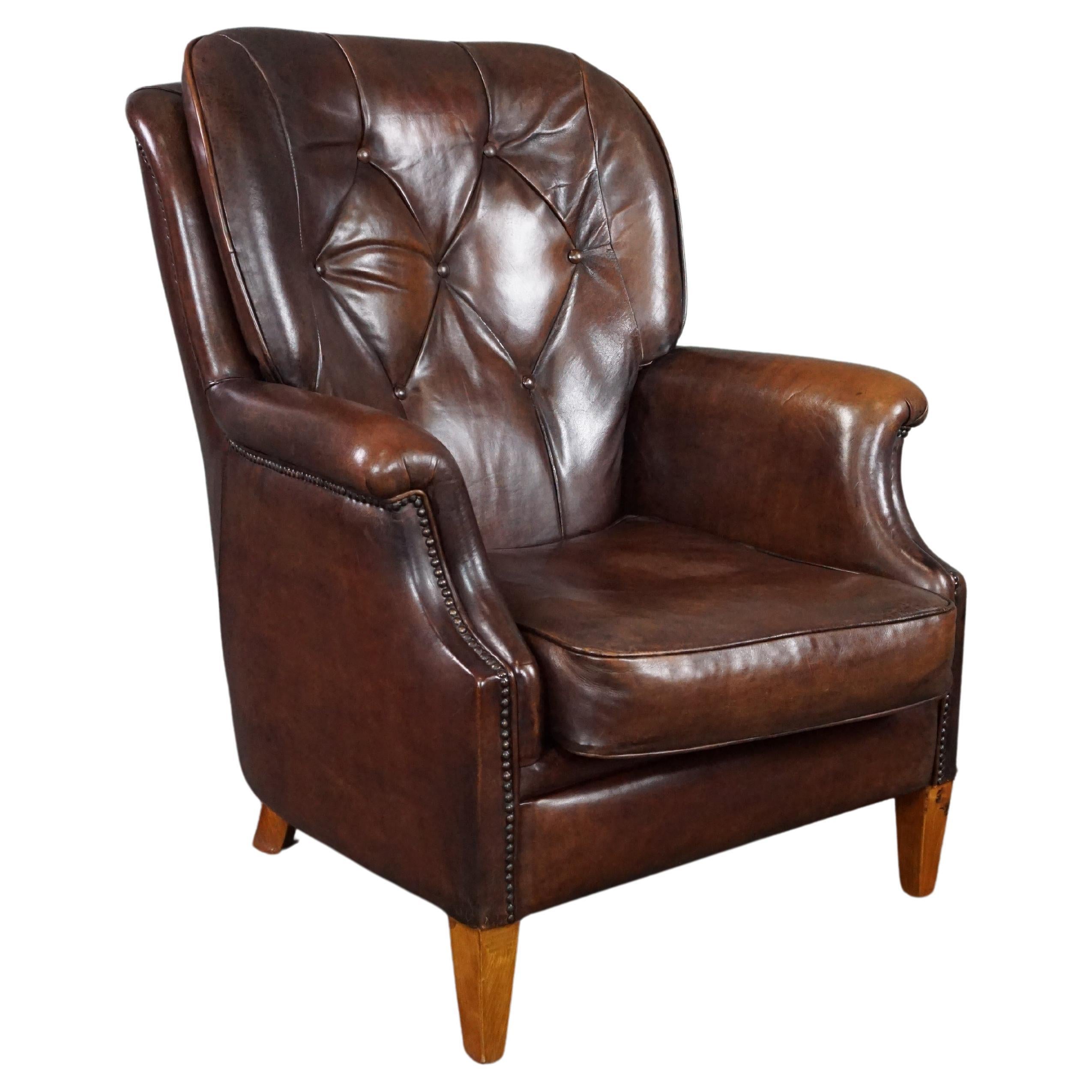 Very comfortable and beautifully colored sheep leather armchair For Sale