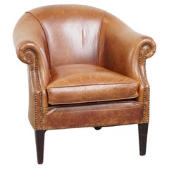 Fauteuil club très confortable et élégant avec un coussin de siège amovible