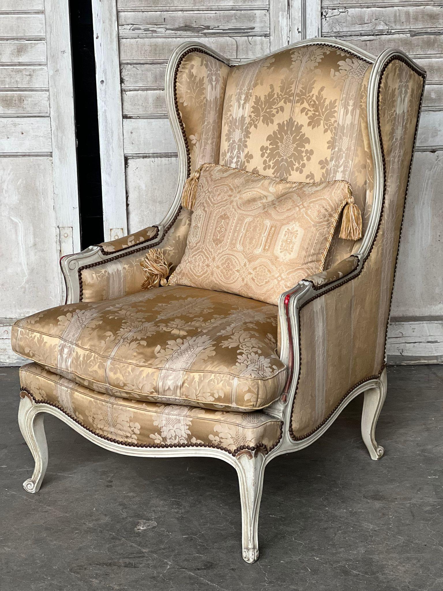 A rare French Wing Bergere armchair which I can vouch for being extremely comfortable having been at home for a year! Also has generous proportions.
The frame is strong and sturdy and has its original finish and patina which is slightly worn just