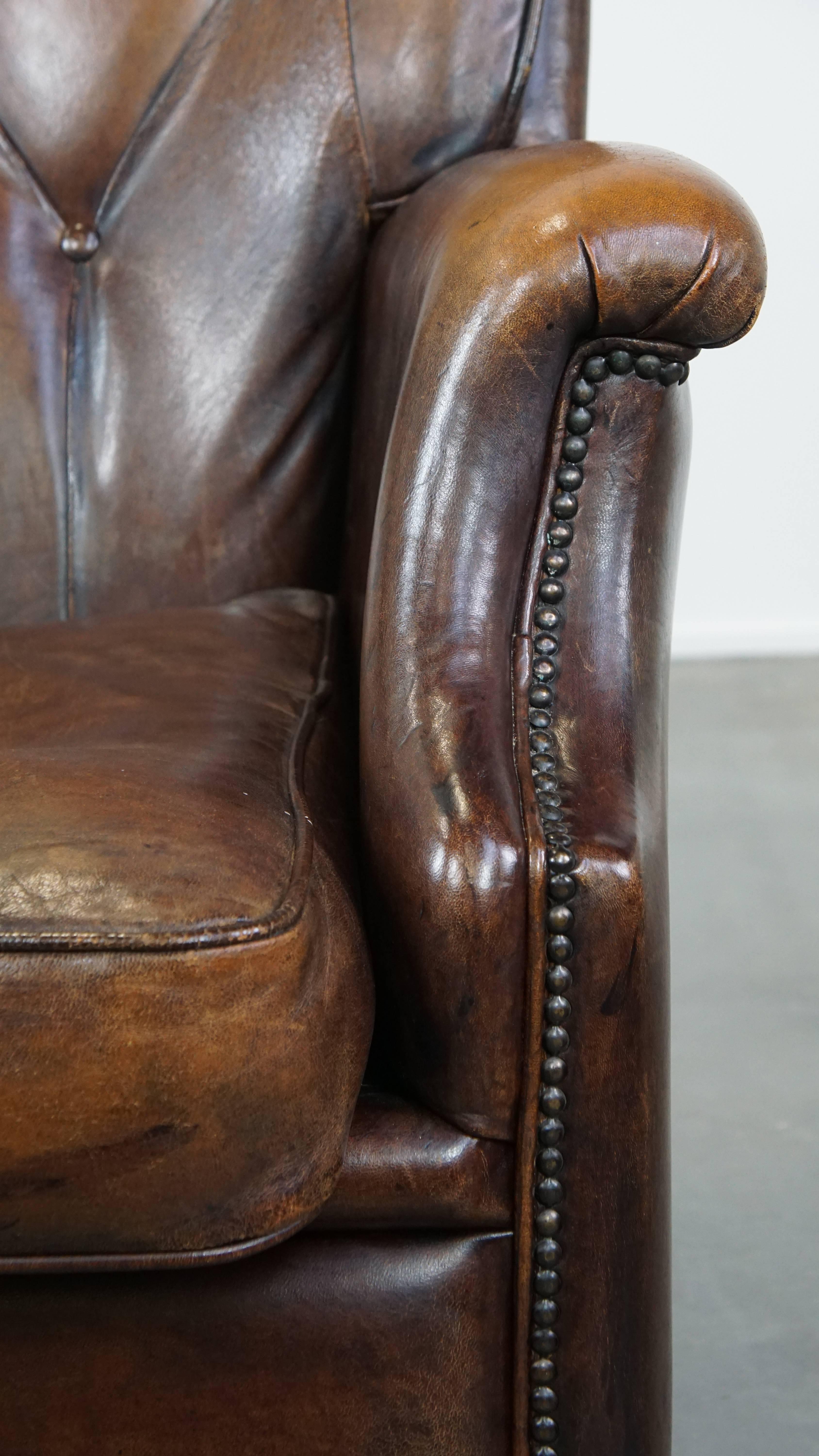 Very Comfortable Sheepskin Leather Armchair in a Beautiful Dark Warm Color For Sale 4