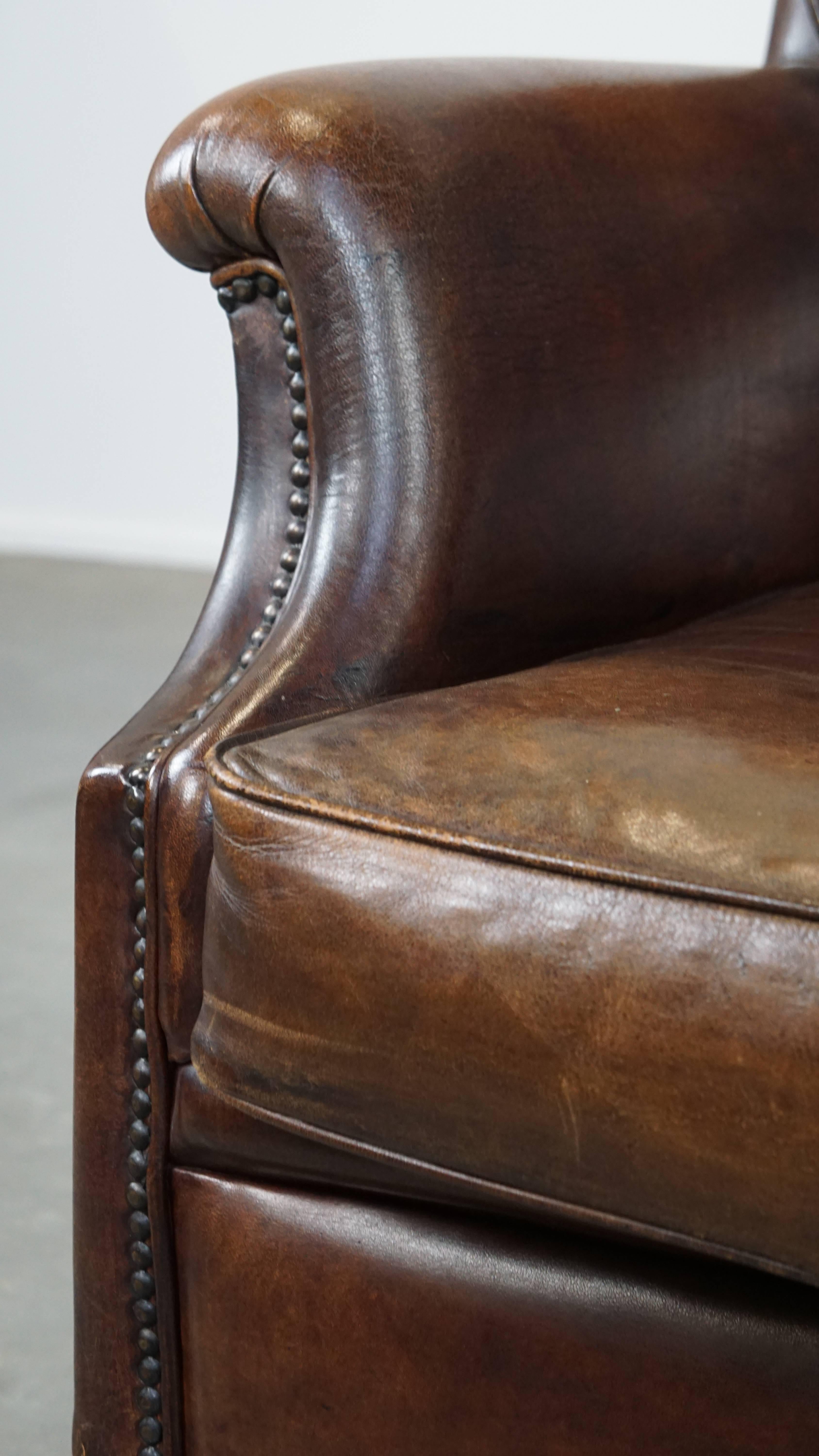 Very Comfortable Sheepskin Leather Armchair in a Beautiful Dark Warm Color For Sale 6