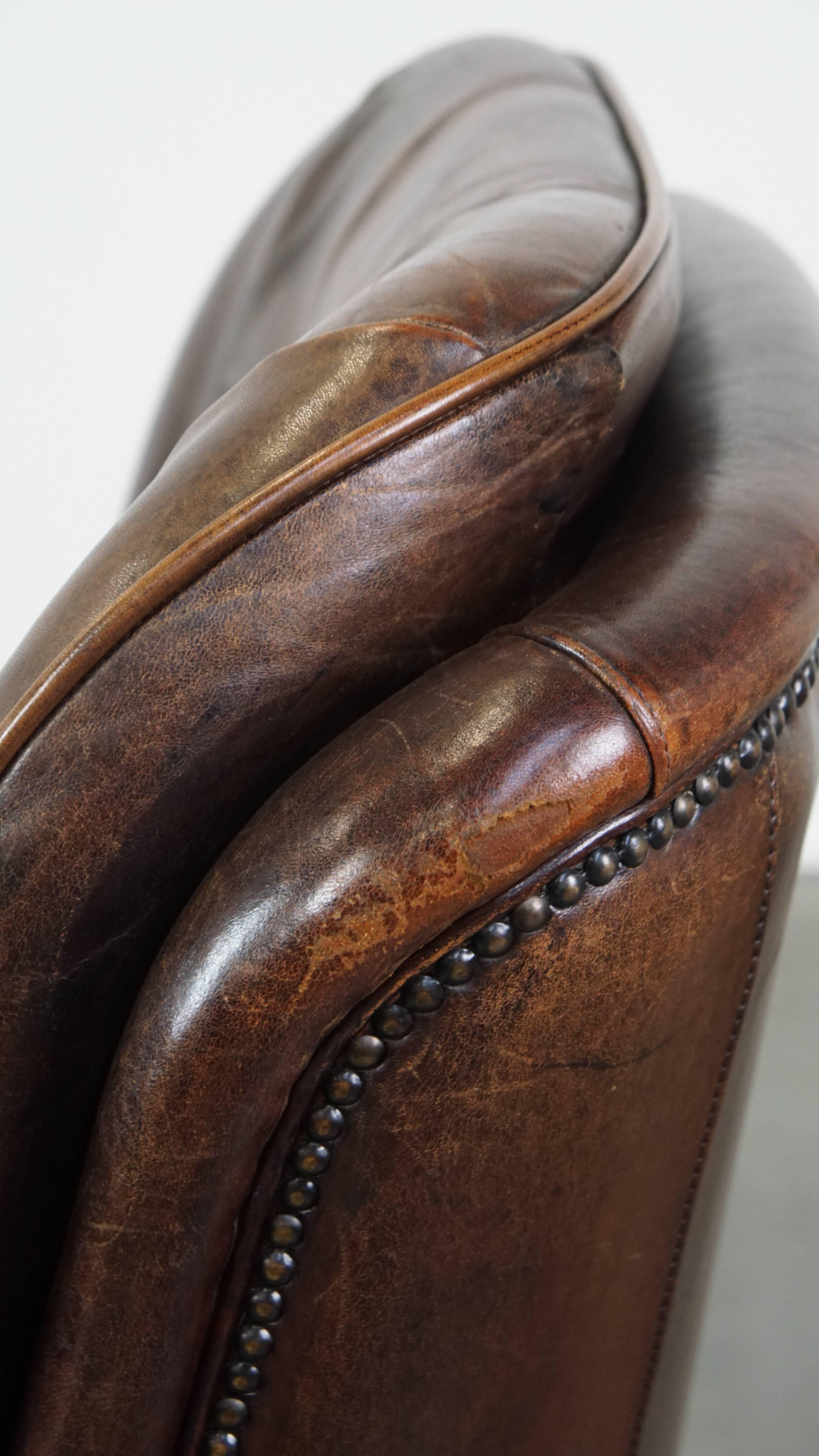 Very Comfortable Sheepskin Leather Armchair in a Beautiful Dark Warm Color For Sale 7