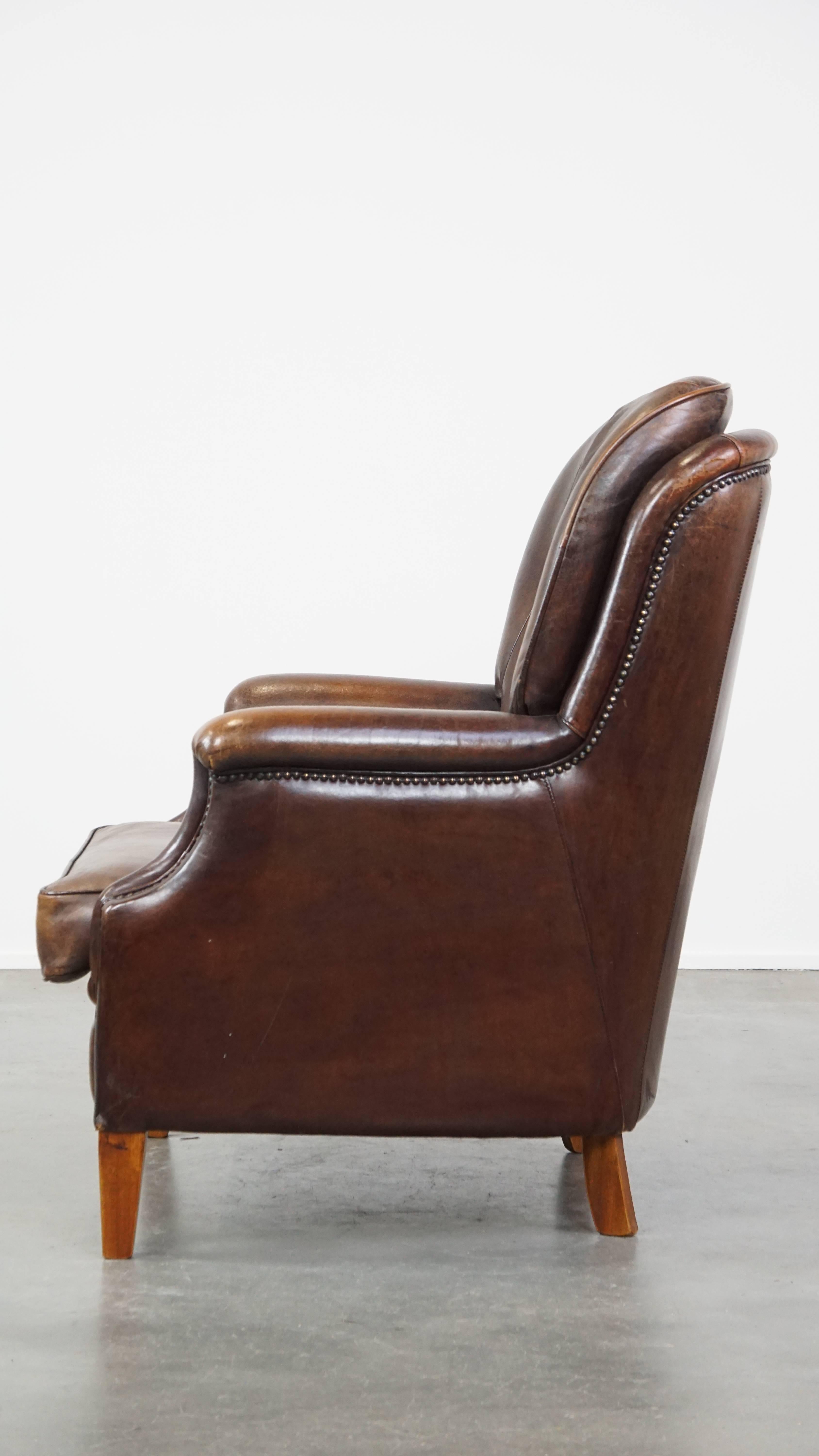 Very Comfortable Sheepskin Leather Armchair in a Beautiful Dark Warm Color In Good Condition For Sale In Harderwijk, NL