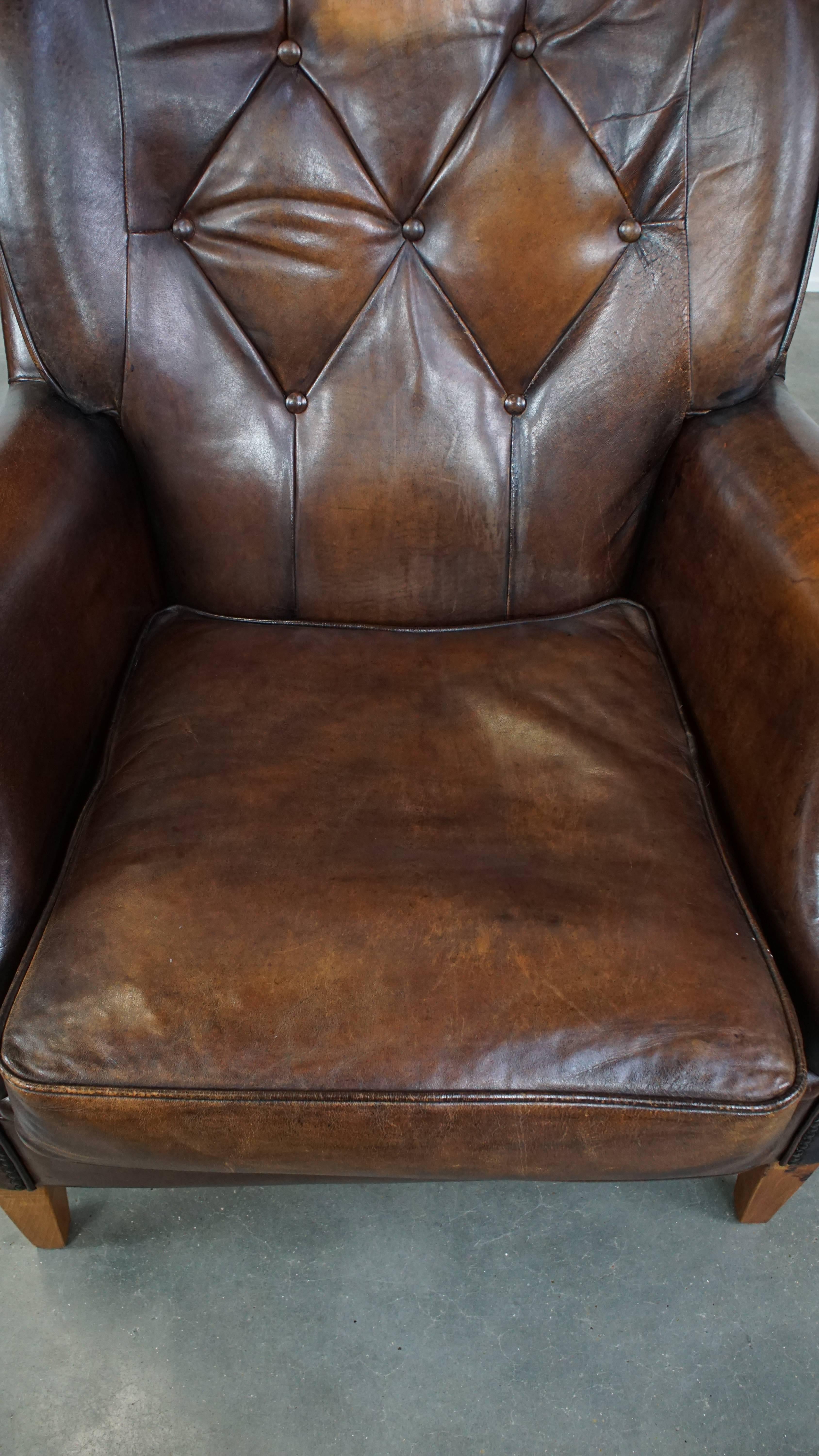 20th Century Very Comfortable Sheepskin Leather Armchair in a Beautiful Dark Warm Color For Sale