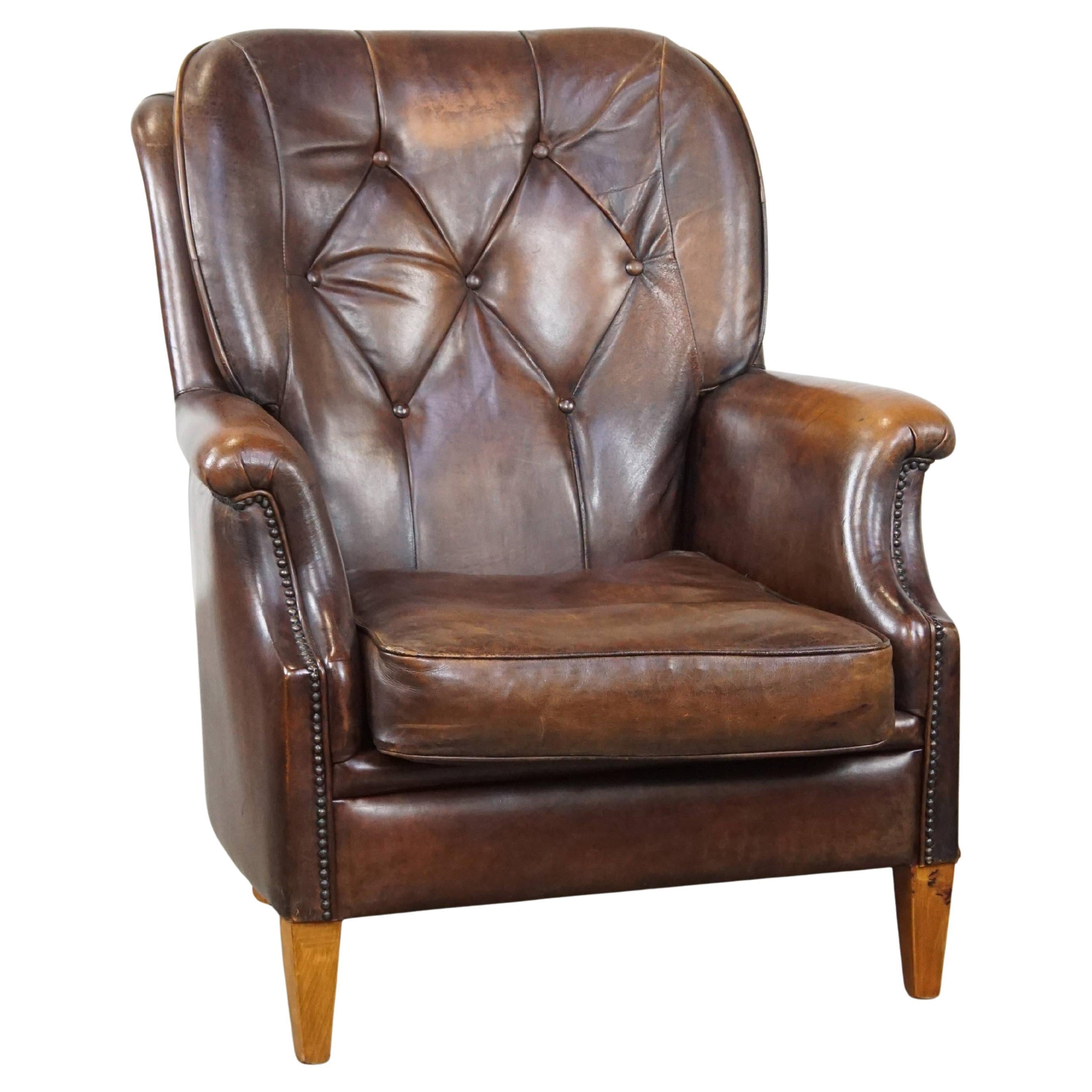 Very Comfortable Sheepskin Leather Armchair in a Beautiful Dark Warm Color For Sale