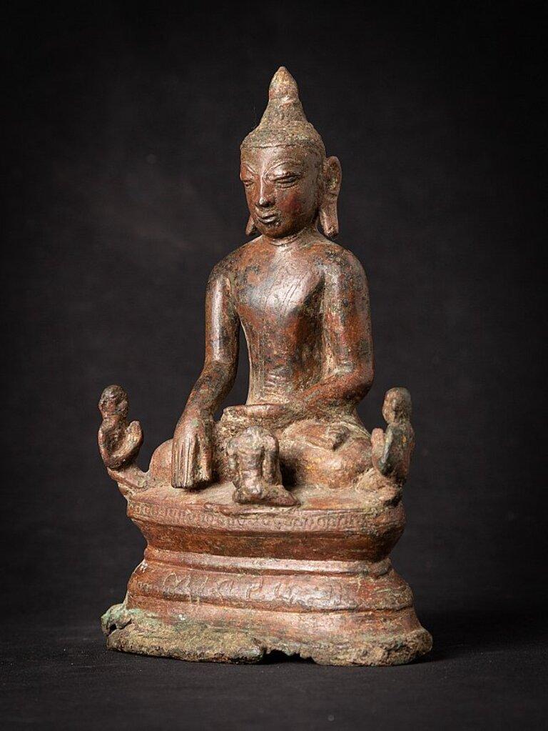 Material: bronze
22,4 cm high 
14,5 cm wide and 8 cm deep
Weight: 1.242 kgs
Ava style
Bhumisparsha mudra
Originating from Burma
15th century - early Ava period
Very rare !
