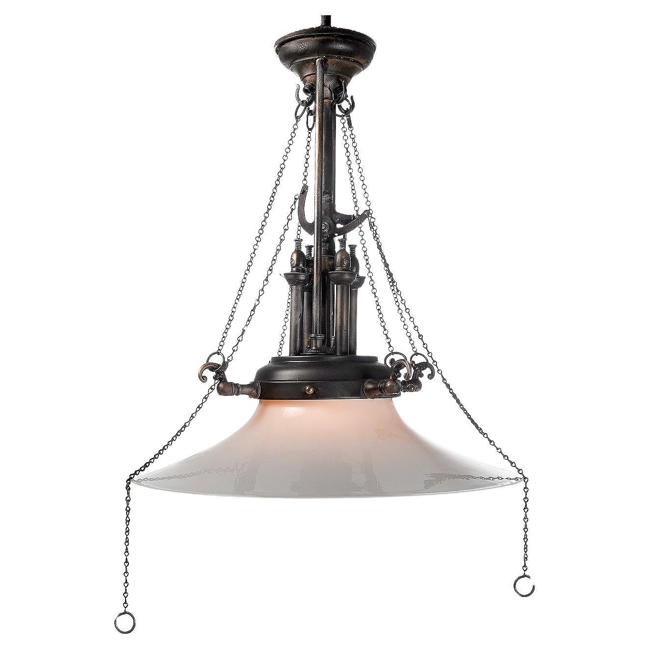As you can imagine we see a good deal of lighting. This one I have not seen  and would use in my own home. This was a 4 burner gas lamp with all the valves and adjustments crowning a large and beautiful 18 inch diameter milk glass shade. We were