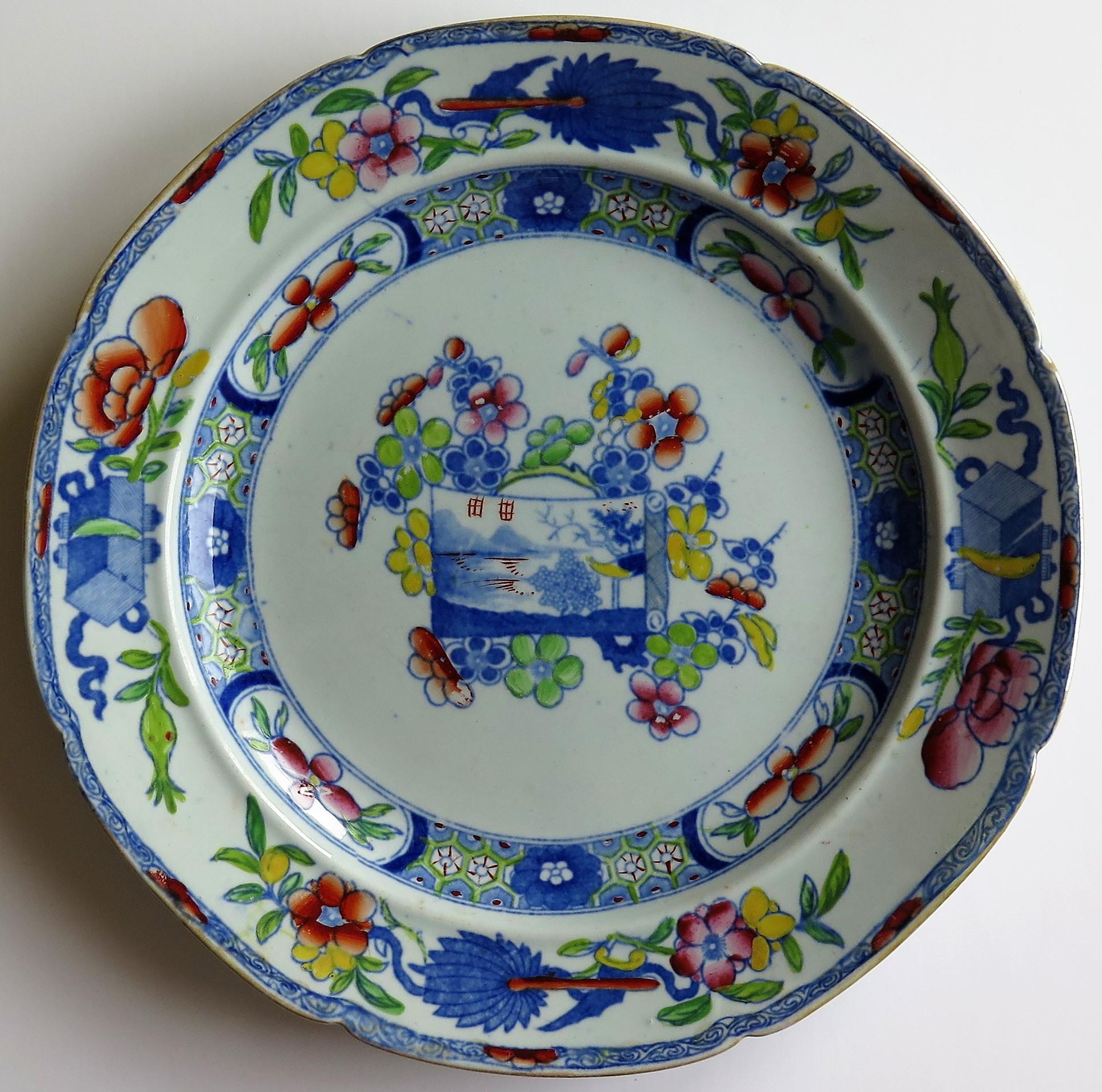 This is an ironstone pottery deep plate or bowl produced by the Mason's factory at Lane Delph, Staffordshire, England during their initial period of Ironstone production, circa 1815.

The plate or bowl is decorated in one of the rarer chinoiserie