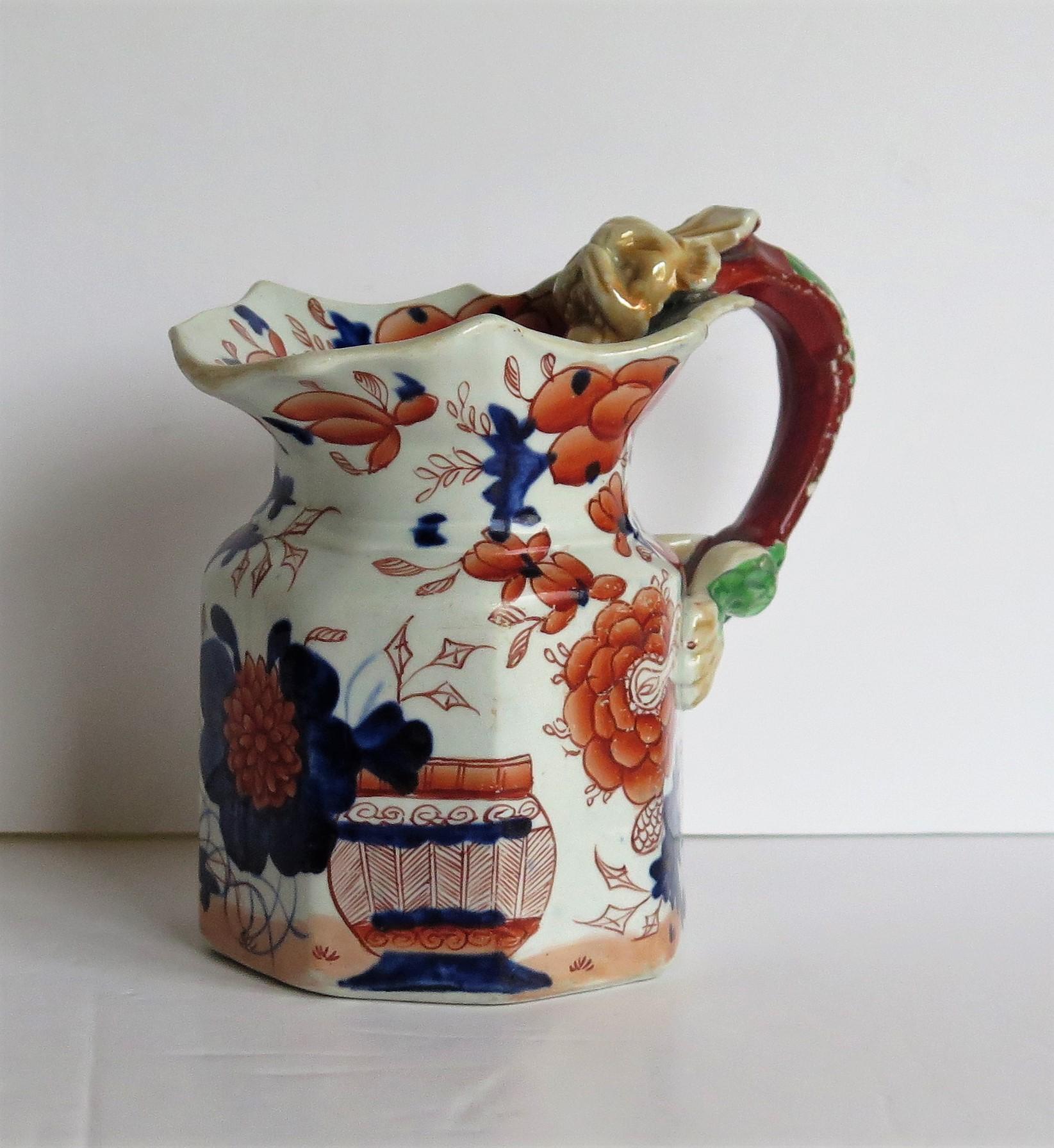This is a very early, decorative Mason's Ironstone Jug or pitcher, made at their Lane Delph factory, Staffordshire Potteries, England, in the early 19th century, George 111rd period, circa 1815.

This jug has the 