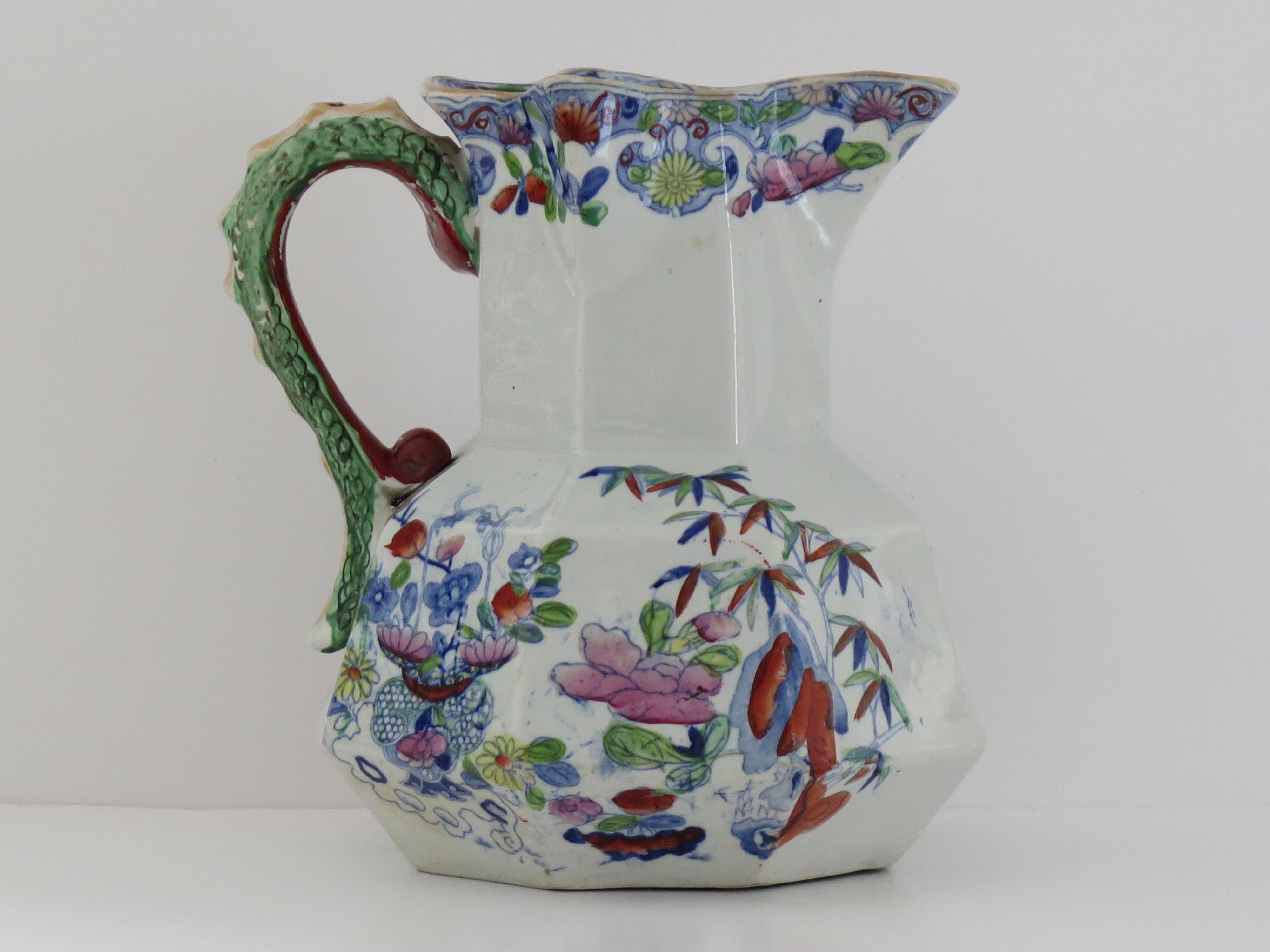 This is a good, very early Masons ironstone Large hydra jug or pitcher, dating to the early 19th century period of George 111, Circa 1818.

The jug is well potted in the octagonal hydra shape with a snake handle.

It has typical early Mason's
