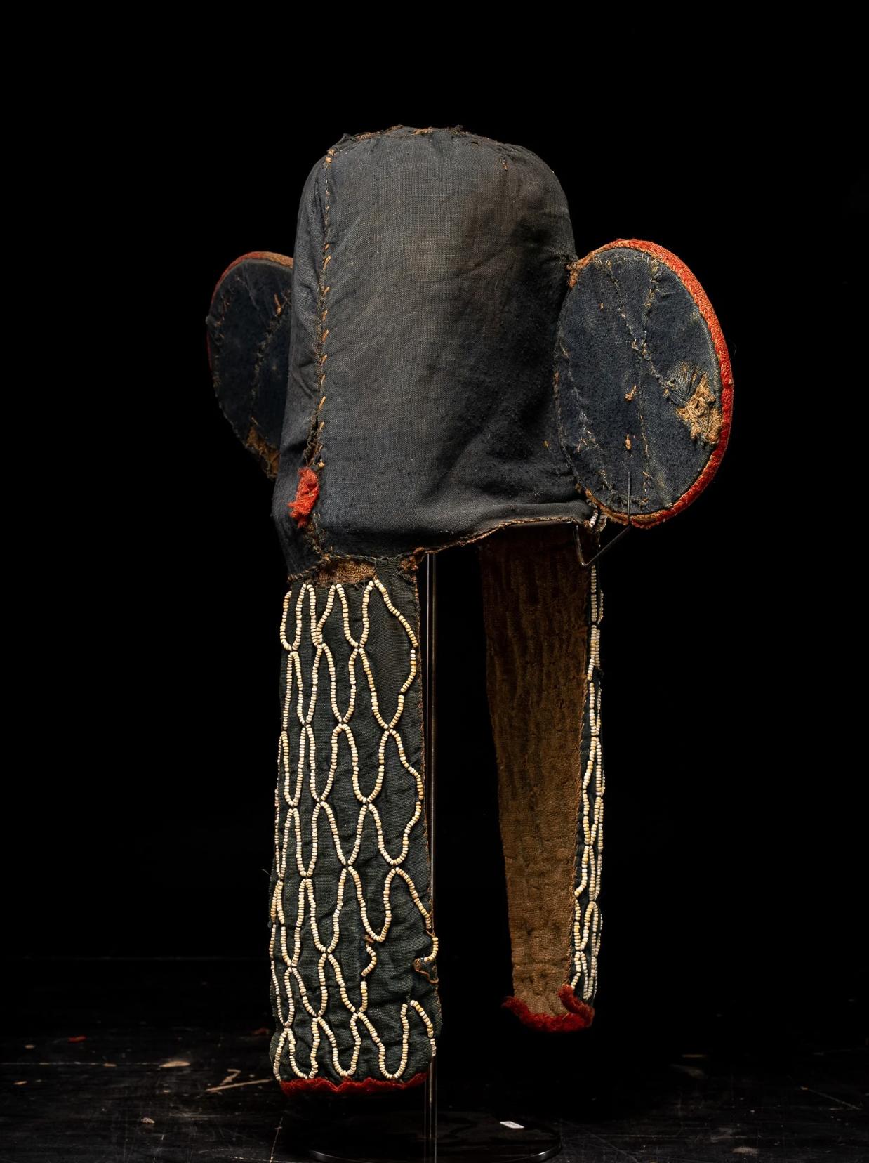 20th Century Very early Monocolor Bamileke Elephant Mask embroided with white trade beads. For Sale