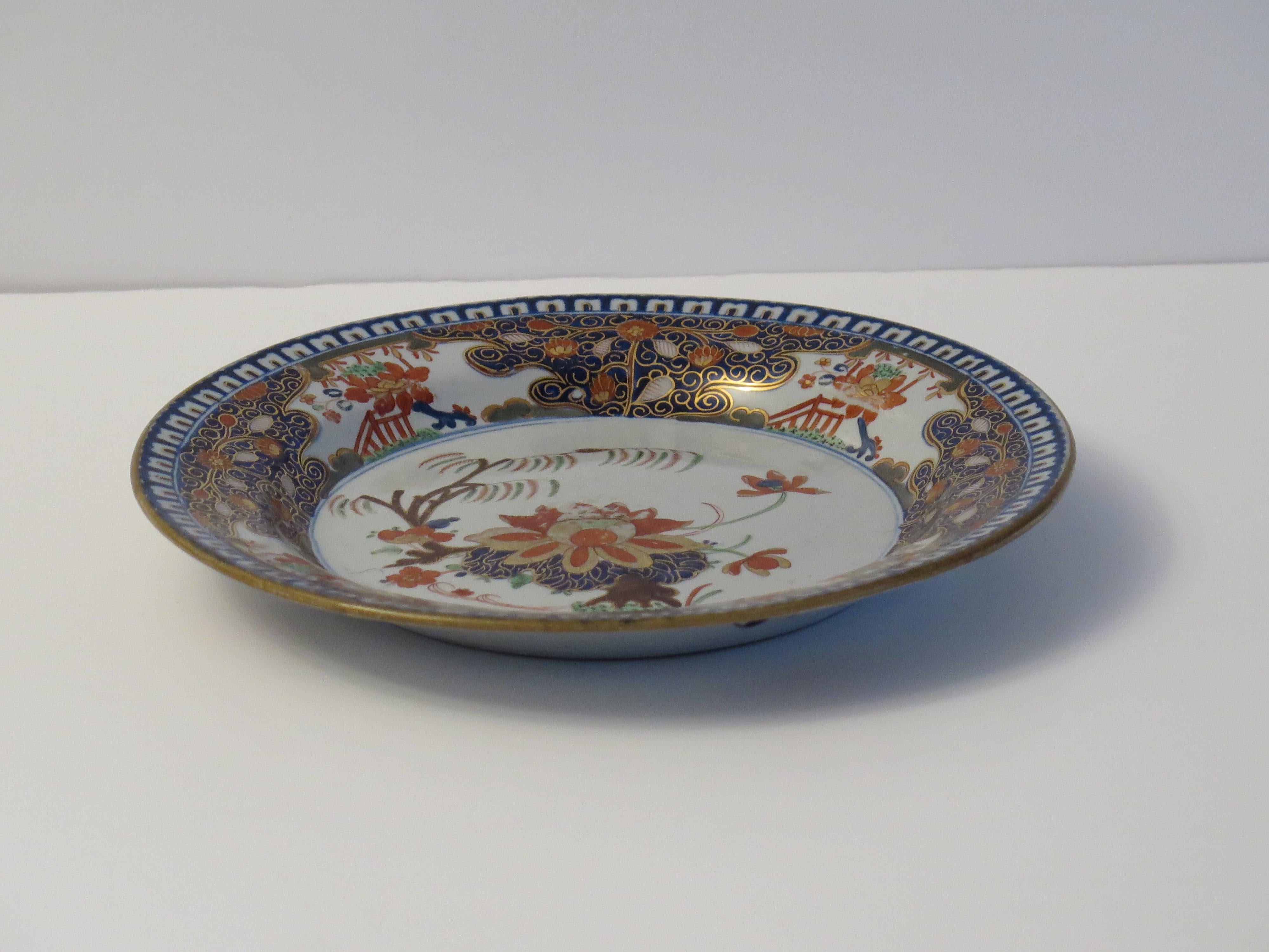 This is a finely hand painted Stone China ( Ironstone) Plate or Dish made by John Turner of Lane End, Staffordshire very early in the 19th Century, Circa 1800 to 1806.

The piece is well potted as a footed dish or plate.

The pattern is beautifully