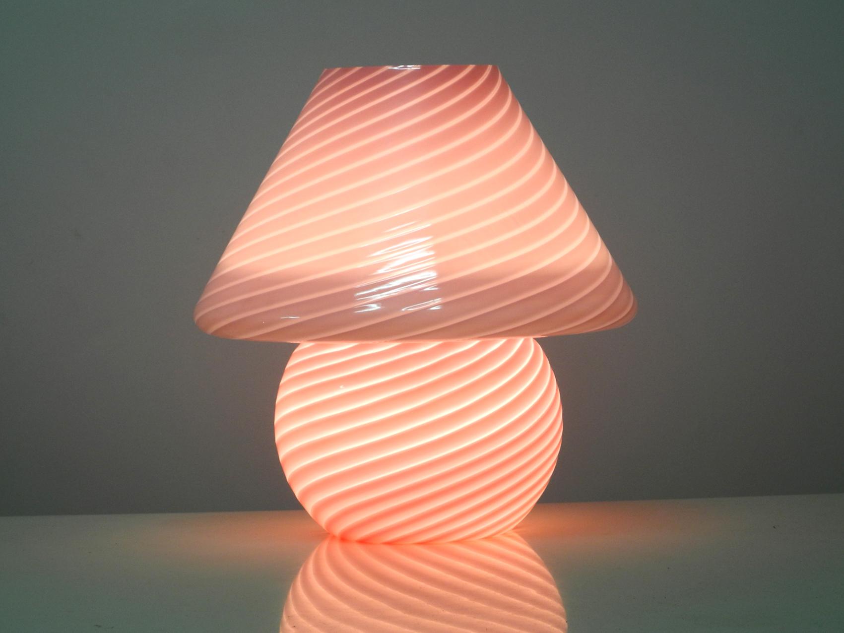 Beautiful very elegant 1960s large Vetri pink Murano glass table lamp. 
Manufacturer is Vetri. Made in Italy. Great design. 
Foot and shade are made of one piece of pink Murano glass with some stripes. 
One original E27 socket with original cable