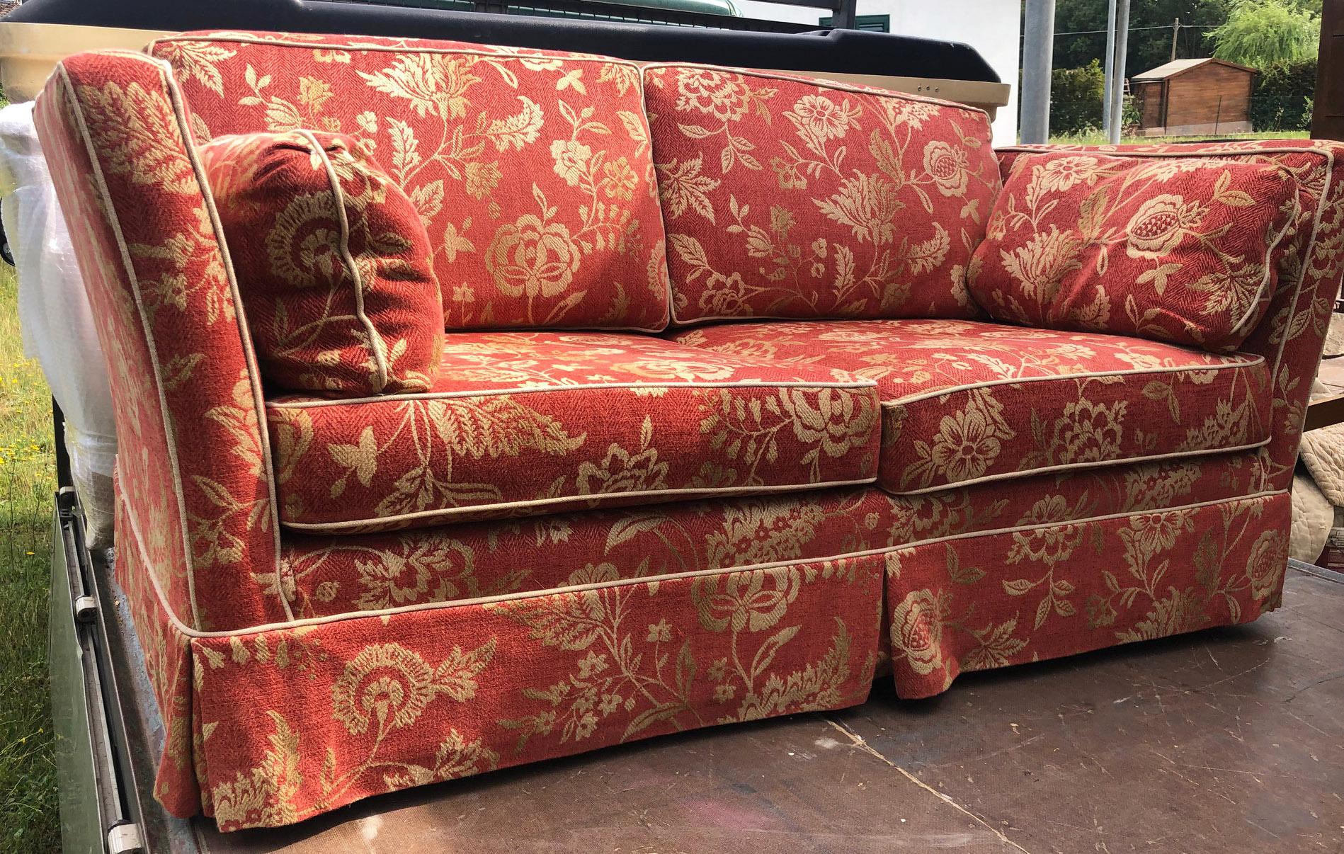 red patterned sofas