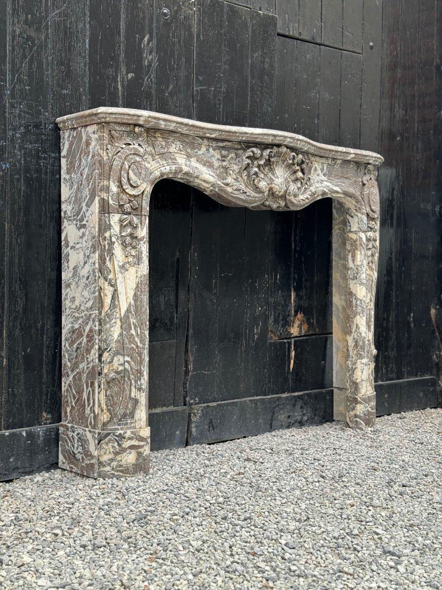 Louis XV fireplace in gray Ardennes marble, 18th century 

Fireplace dimensions: 90 x 110 cm