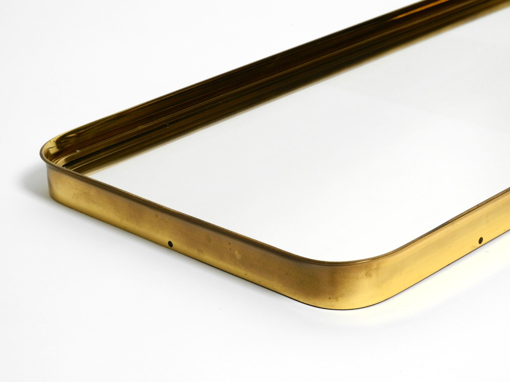 Very Elegant Minimalist Mid Century Brass Wall Mirror by Vereinigte Werkstätten For Sale 7