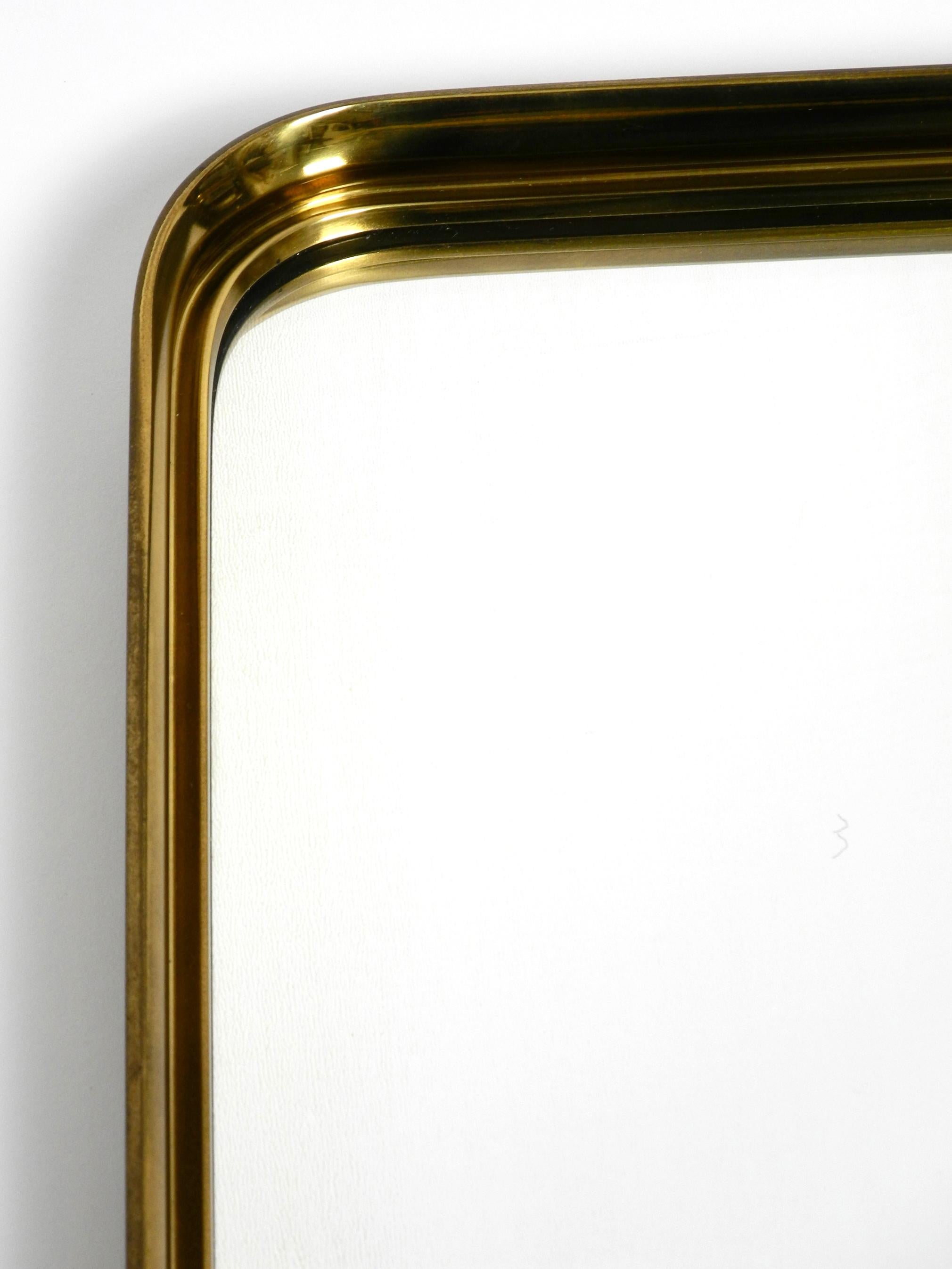 Very Elegant Minimalist Mid Century Brass Wall Mirror by Vereinigte Werkstätten For Sale 10
