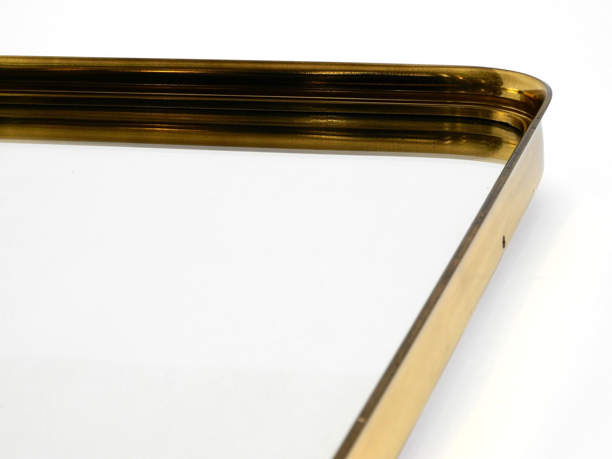 Very Elegant Minimalist Mid Century Brass Wall Mirror by Vereinigte Werkstätten For Sale 13