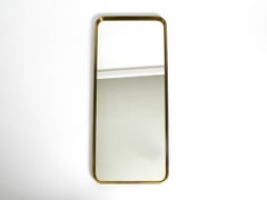 Very Elegant Minimalist Mid Century Brass Wall Mirror by Vereinigte Werkstätten