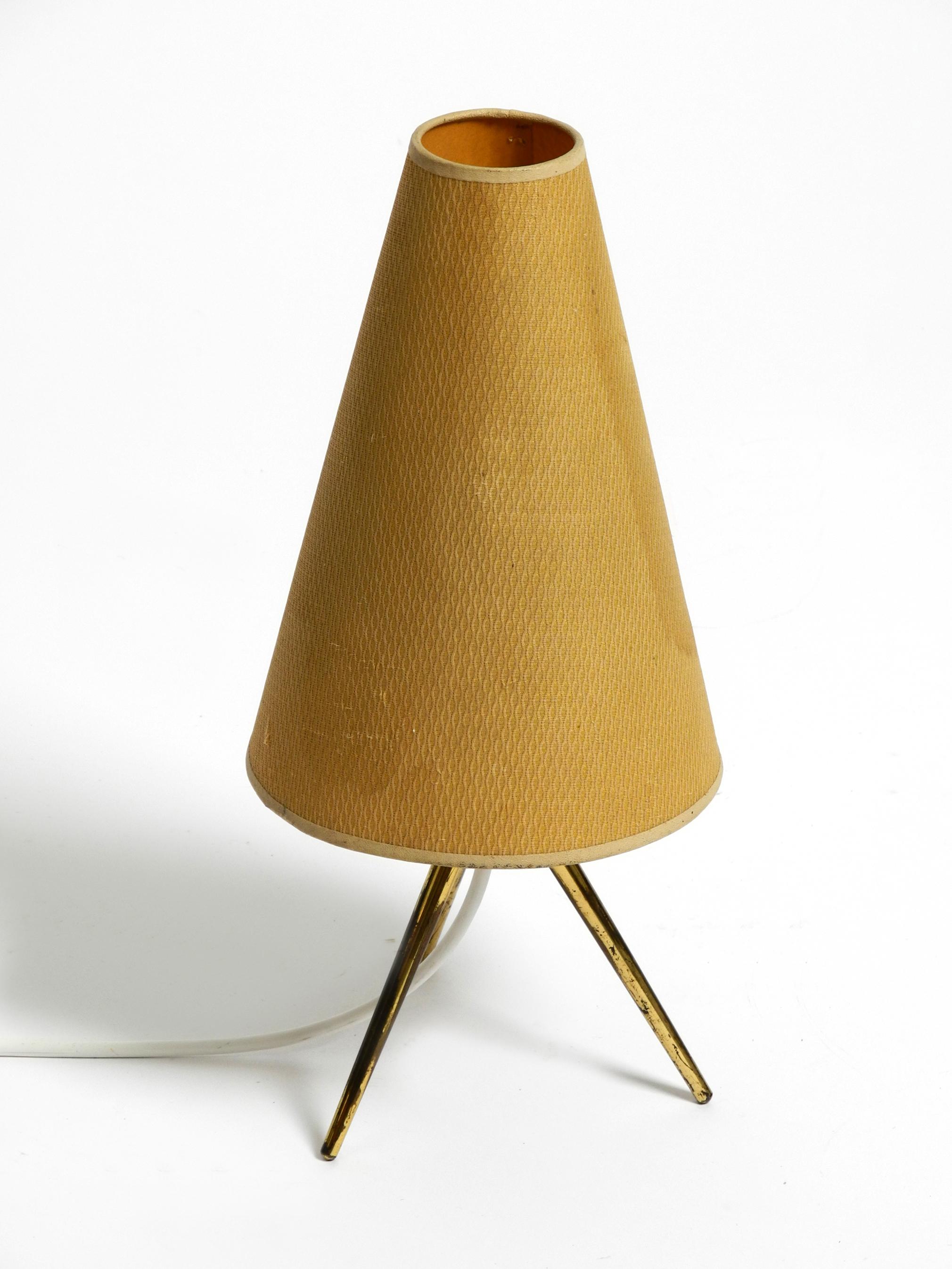 German Very elegant original Mid Century brass tripod table lamp original lampshade For Sale