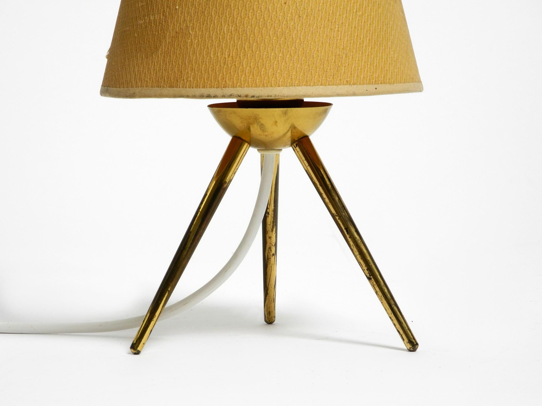 Mid-20th Century Very elegant original Mid Century brass tripod table lamp original lampshade For Sale