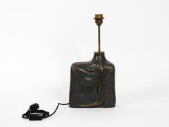 Very elegant table lamp from the 1960s made of heavy bronze with a female figure