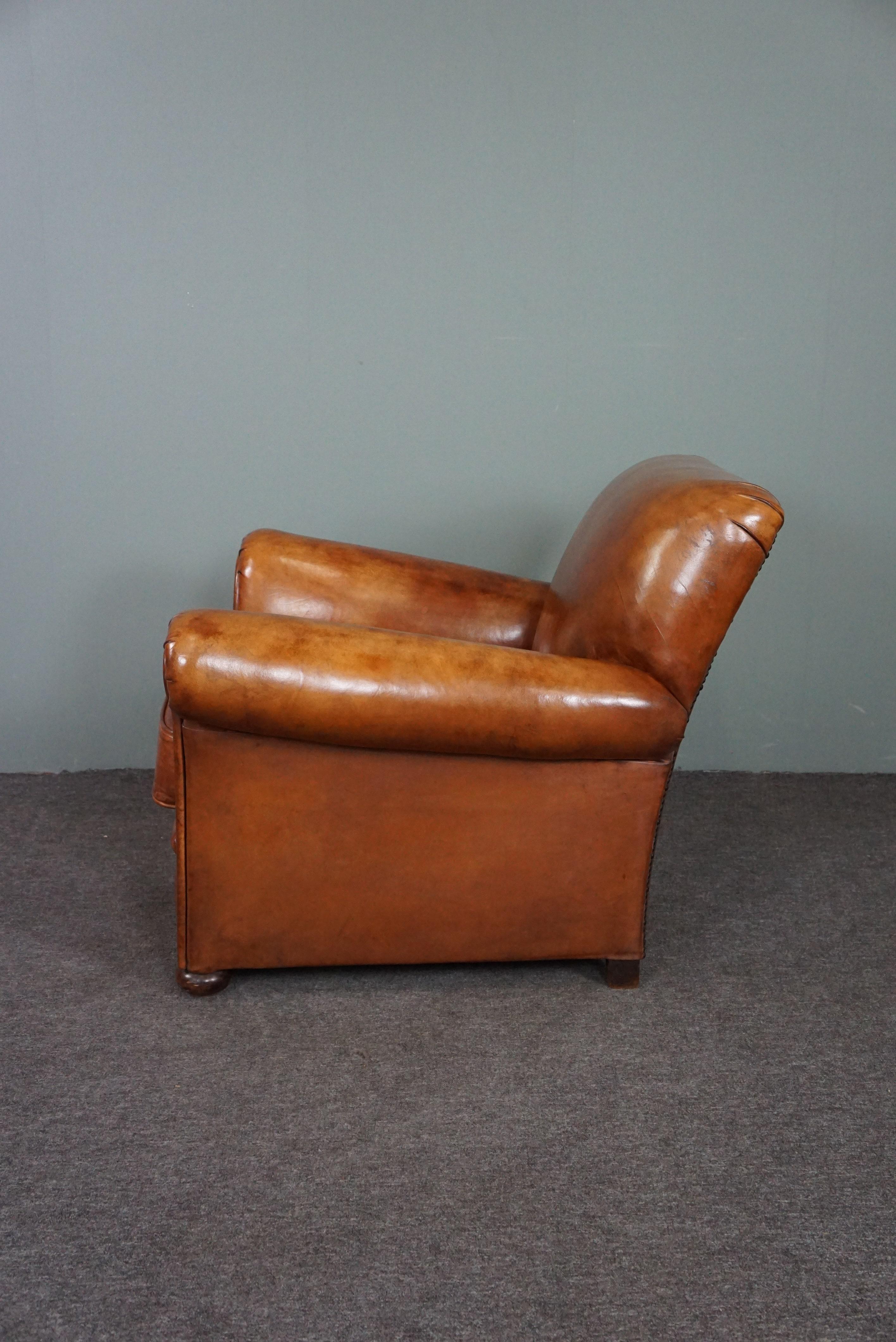 Hand-Crafted Very exclusive newly upholstered old sheep leather armchair For Sale