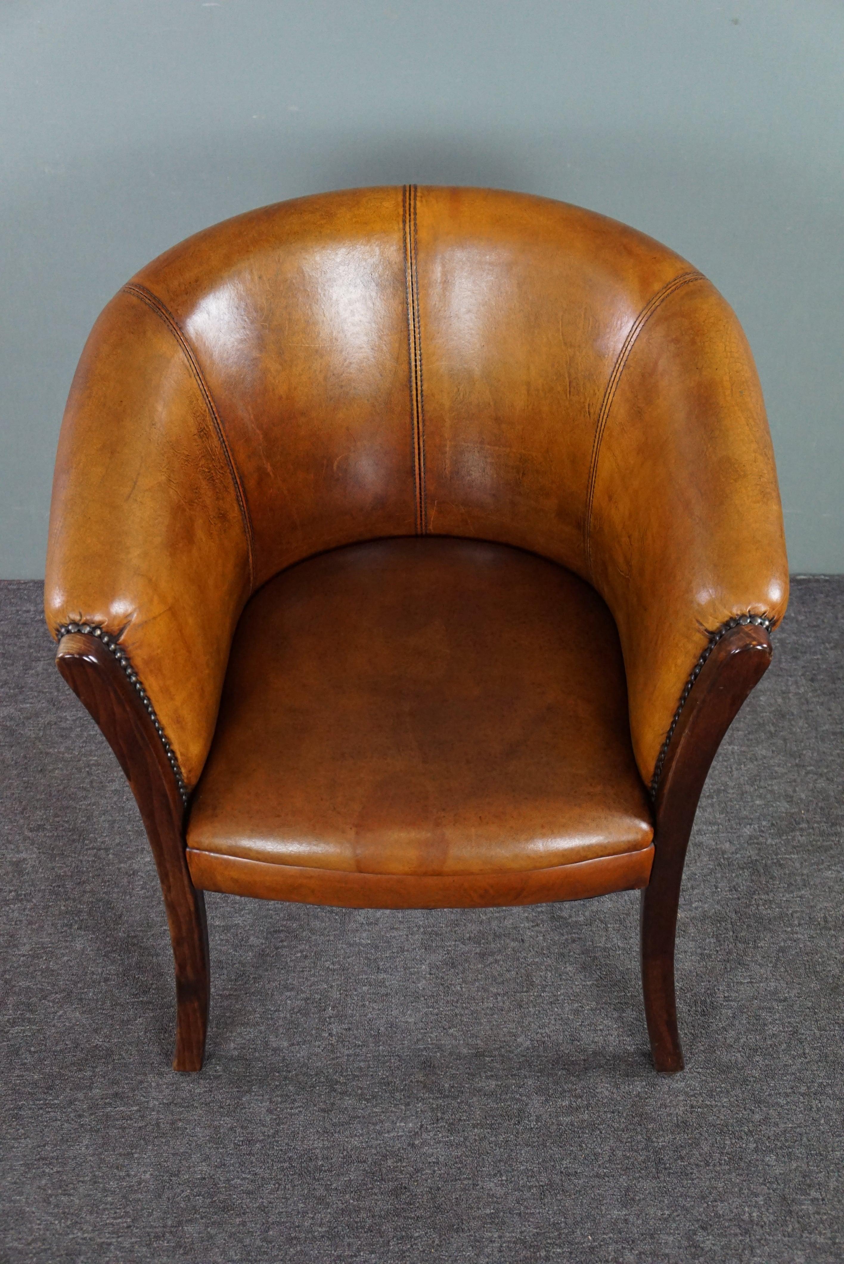Leather Very expressive side chair/tubchair made of sheep leather For Sale
