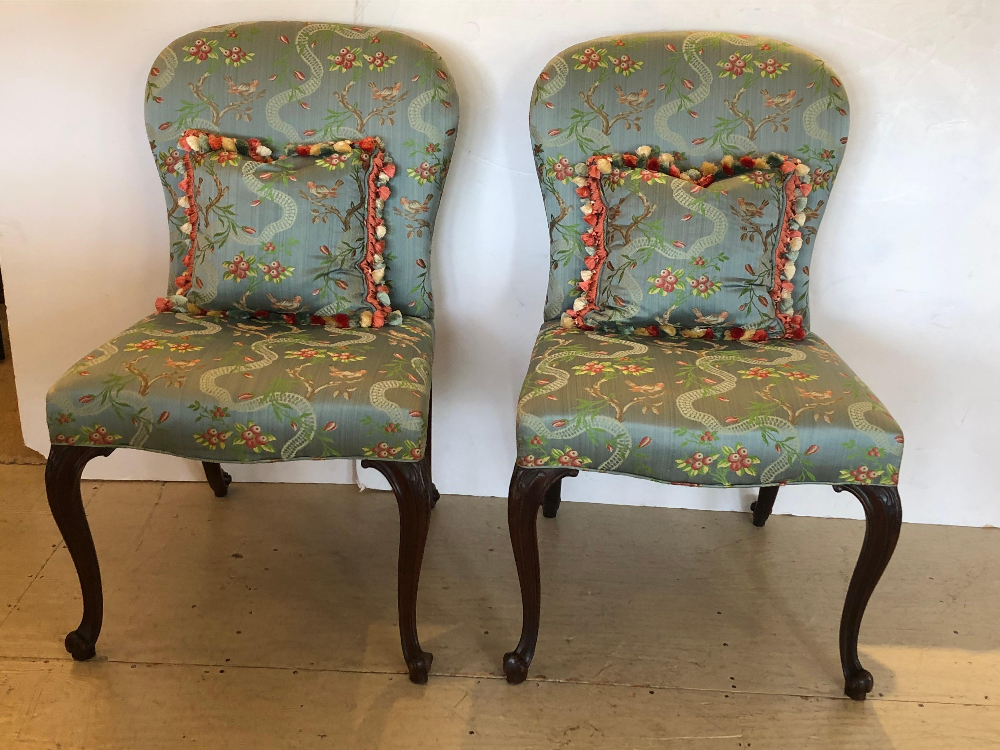 Superbly elegant pair of Georgian 18th century side chairs having mahogany cabriole legs terminating in snail shaped feet, horsehair stuffing in the seat, and more recent sumptuous Scalamandre silk upholstery with foliage and birds. Custom pillows