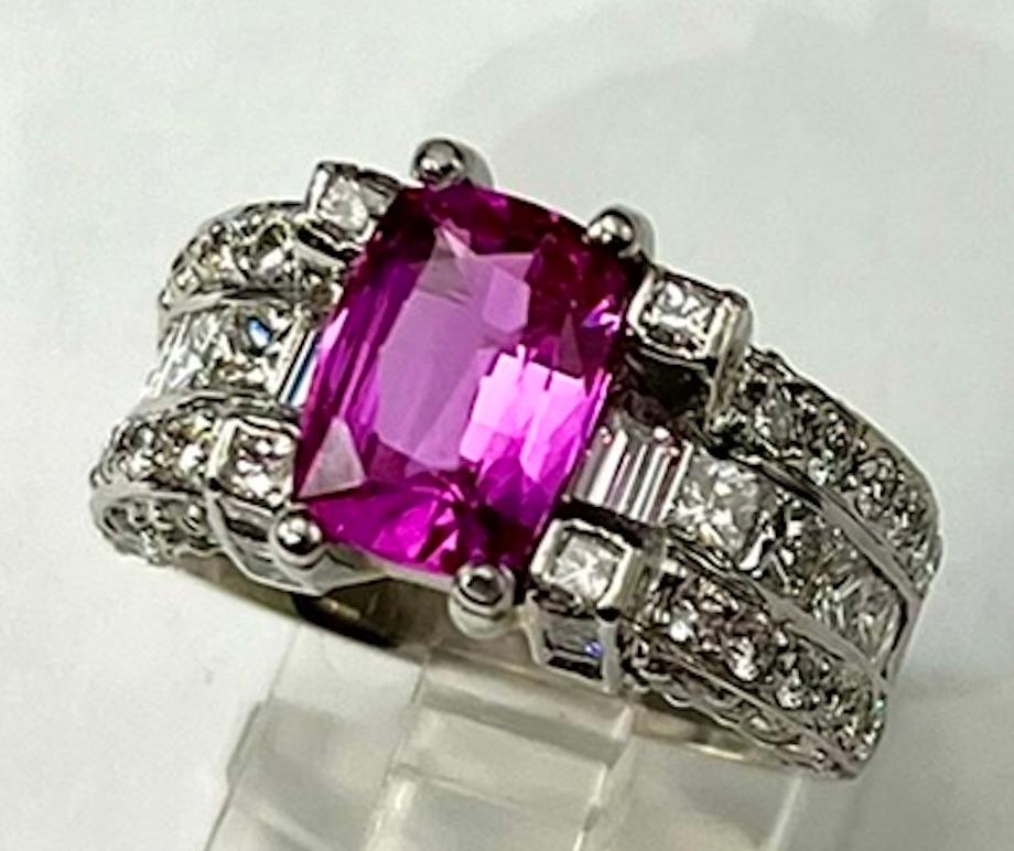 This is a Gem Quality truly rich Bubble Gum Pink Cushion Cut Sapphire. Most pink sapphires do not have the vivid hue of this gemstone. This sapphire exhibits a purity of pink rarely seen while being very clean even under the microscope. It is