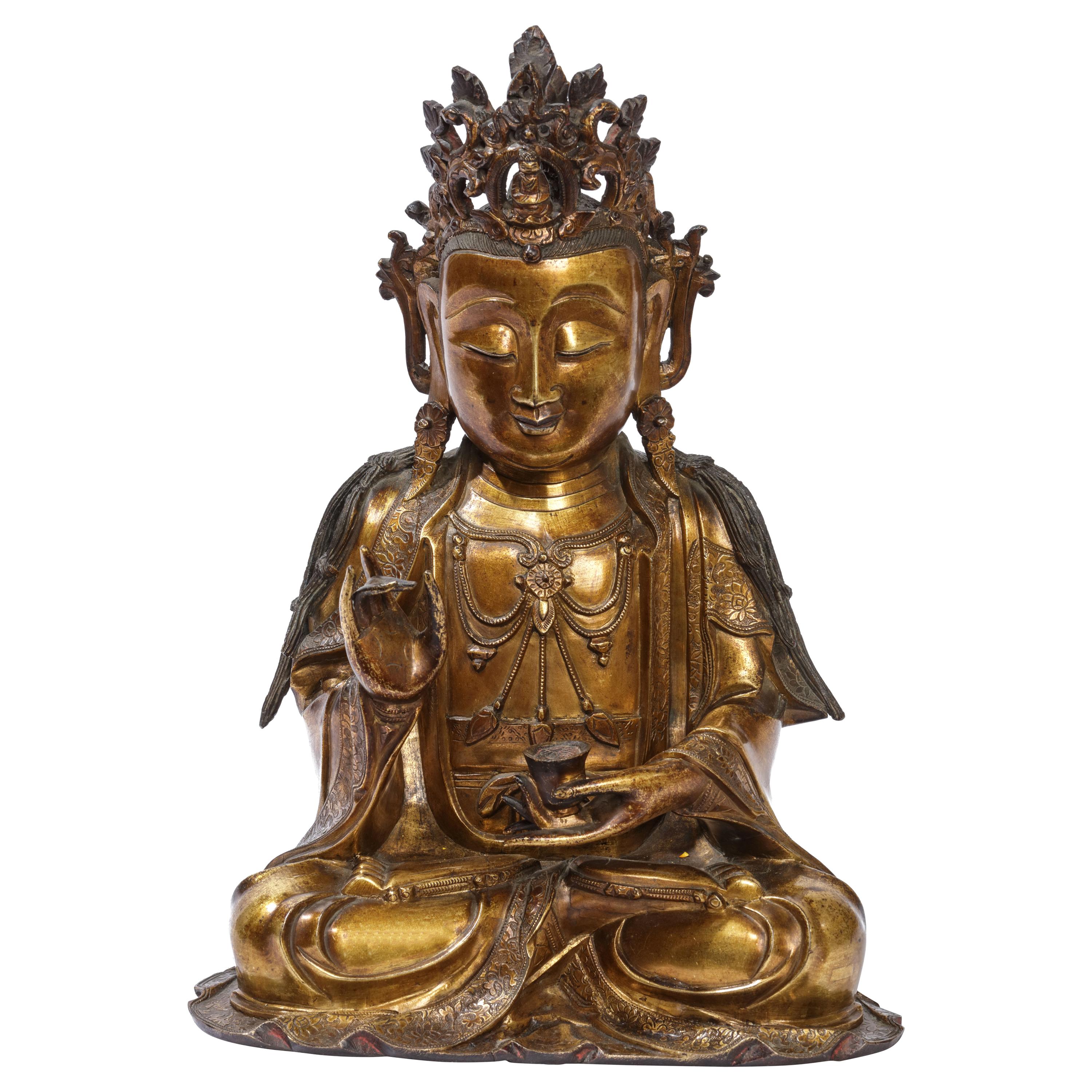 Very Fine and Serene Chinese Gilt-Bronze Figure of Guanyin, 16th Century