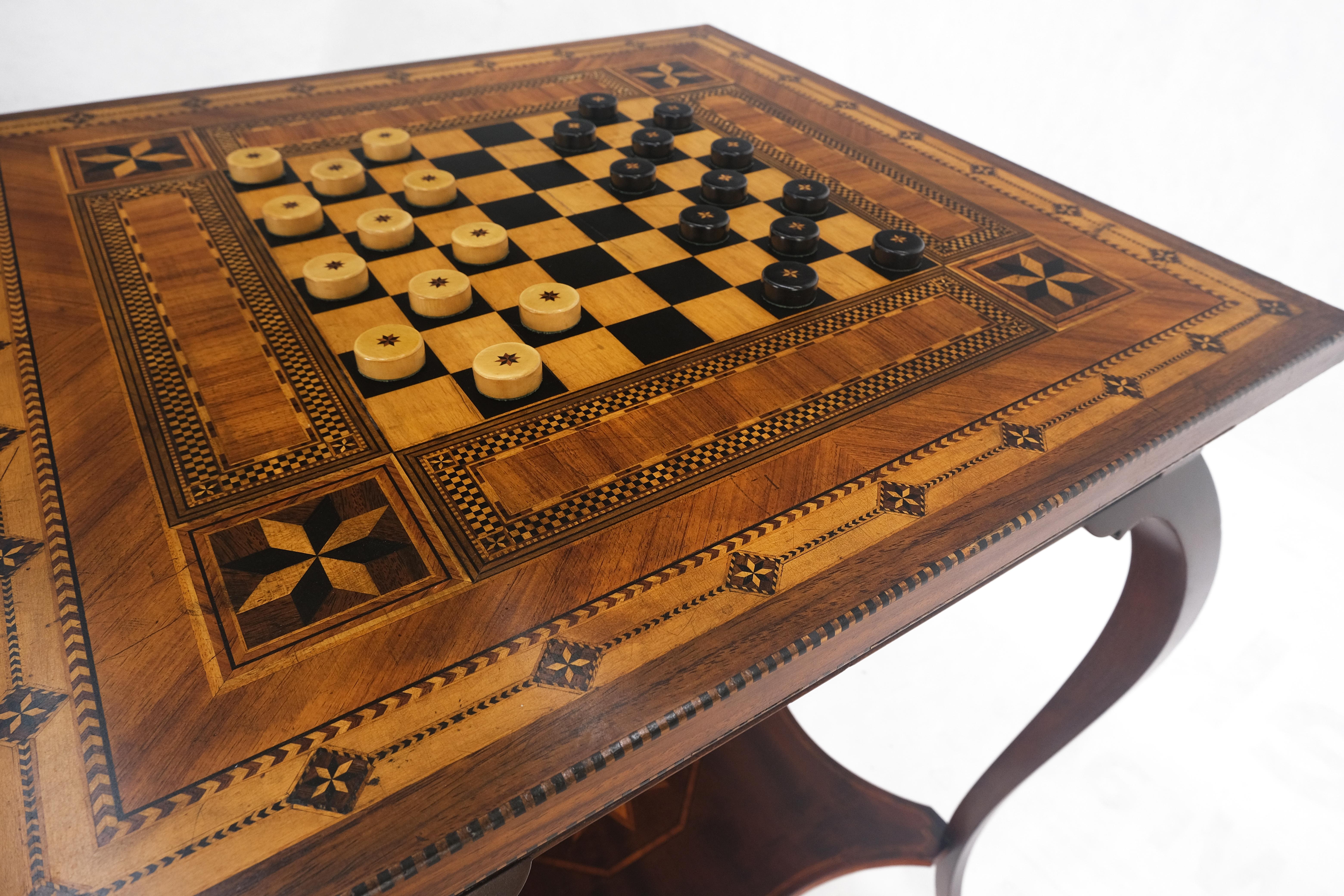 Very Fine Antique Dated !910 Inlay Checkerboard Two Tier Game Table Very Clean.
This table is made out of 12648 pieces of wood.