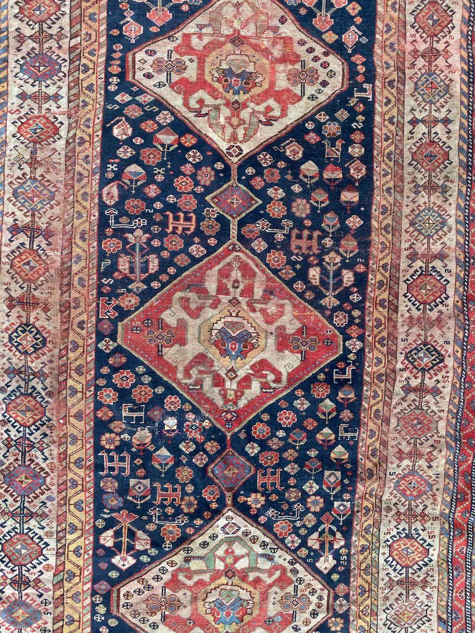 Very beautiful late 19th century rug with tribal geometrical design and nice natural colors with red, blue, green and yellow, entirely and finely hand knotted with wool velvet on wool foundation.