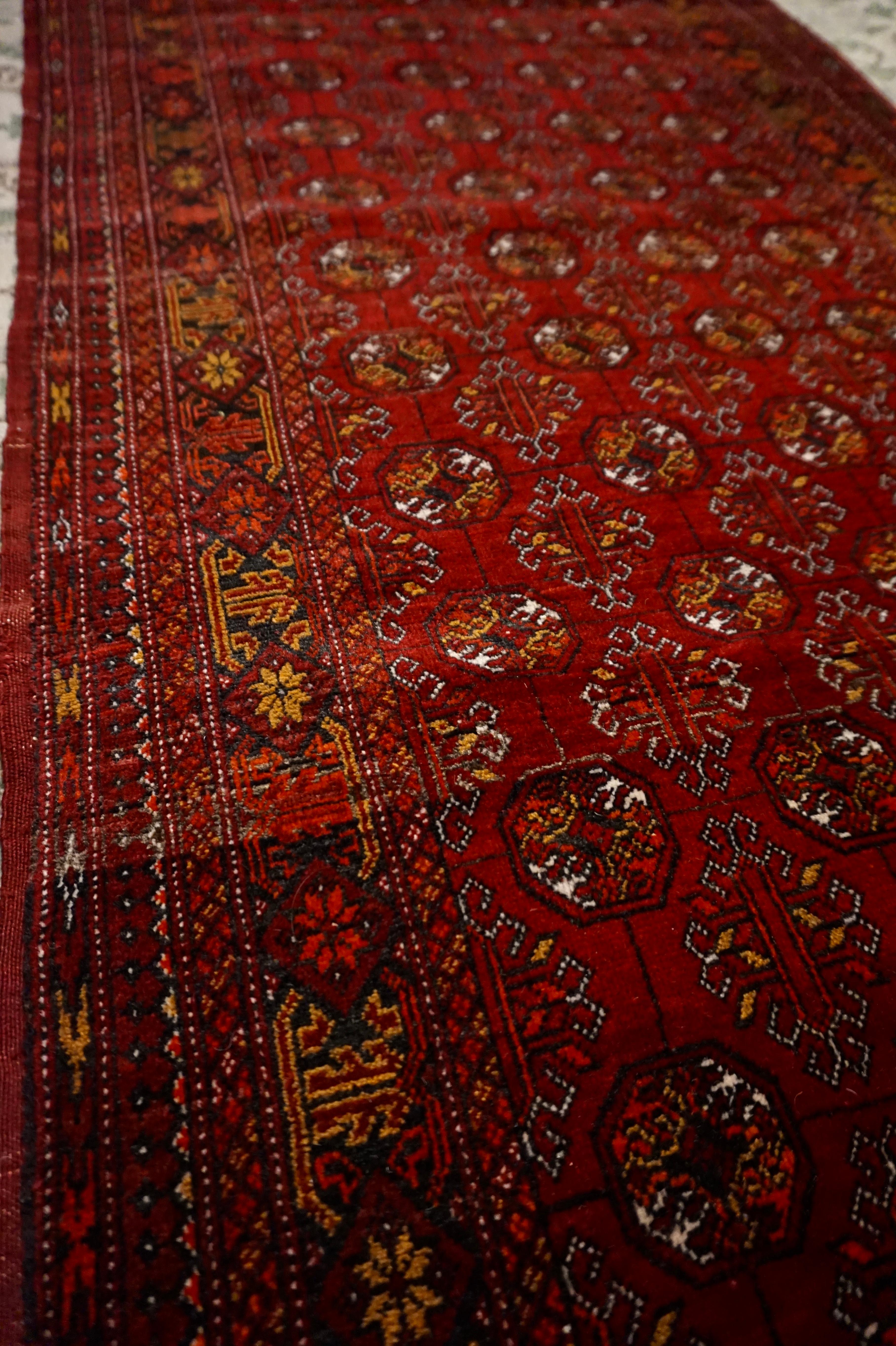 Hand-Knotted Very Fine Antique Hand Knotted Turkmen Crimson & Copper Bokhara Runner For Sale