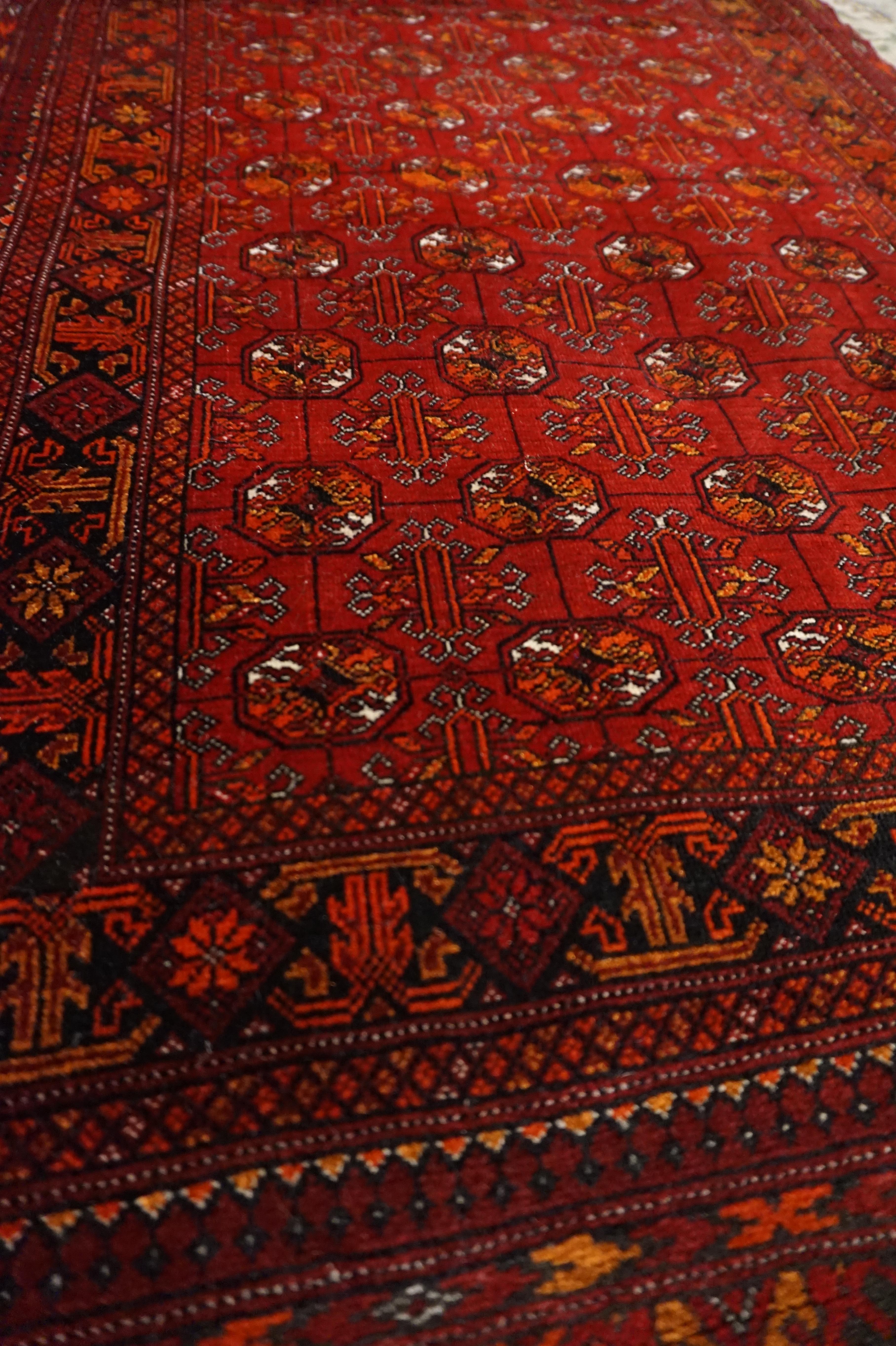 Mid-20th Century Very Fine Antique Hand Knotted Turkmen Crimson & Copper Bokhara Runner For Sale