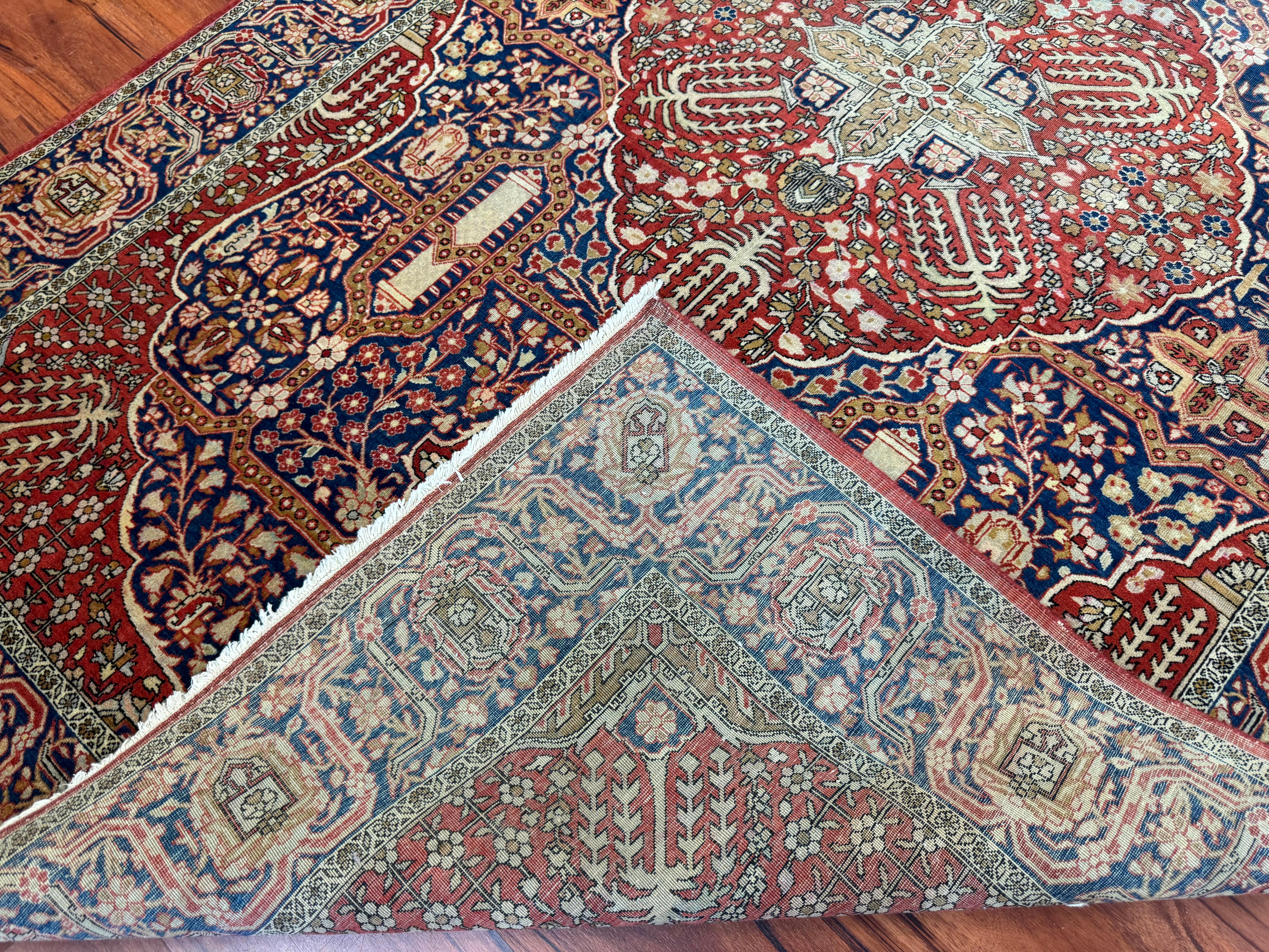 A very rare Extremely Fine Antique Persian Kashan Rug that originates from Iran in the early 1900s. This rug has an unusual design that isn’t seen very often and makes this rug very unique! The beautiful color combinations match the rugs design and