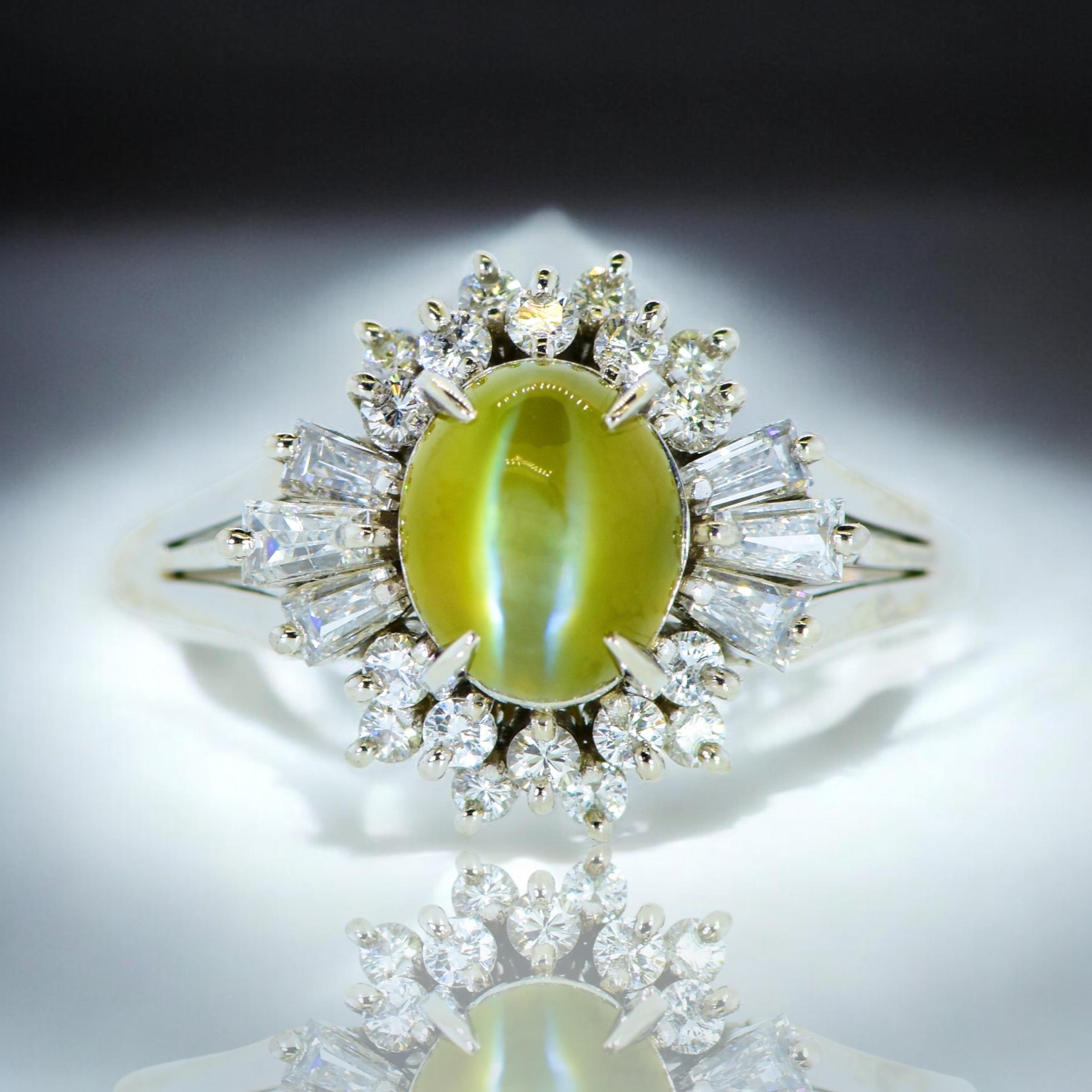 Cabochon Very Fine Intense color Cat's Eye Chrysoberyl & White Diamond Platinum Ring. For Sale