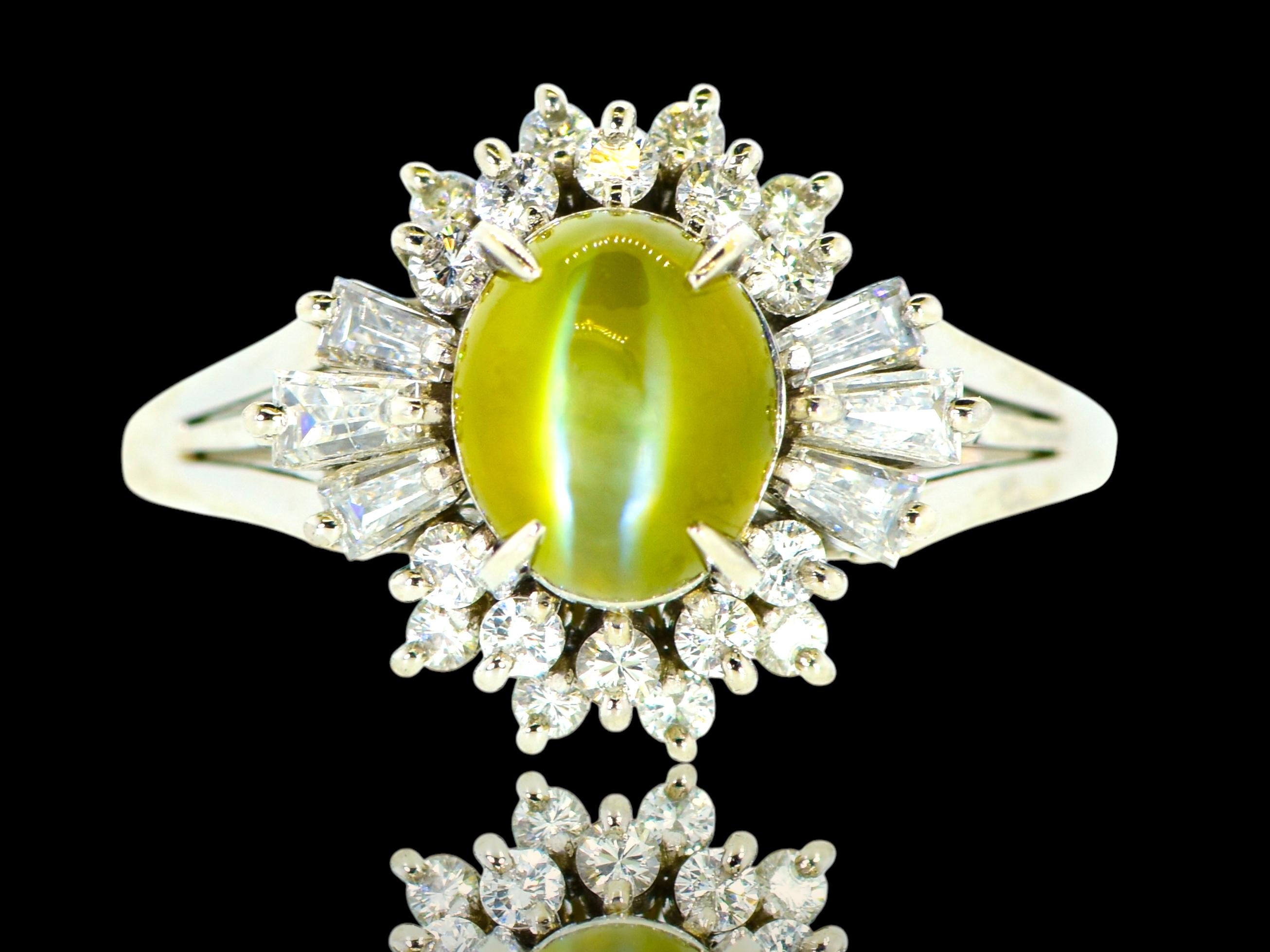 Contemporary Very Fine Intense color Cat's Eye Chrysoberyl & White Diamond Platinum Ring. For Sale